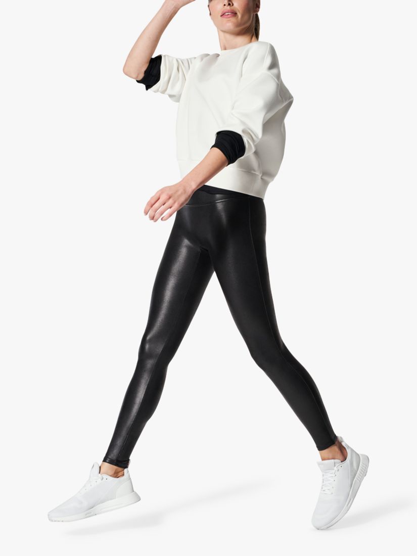 Vintage 80s style shiny black leggings in a size