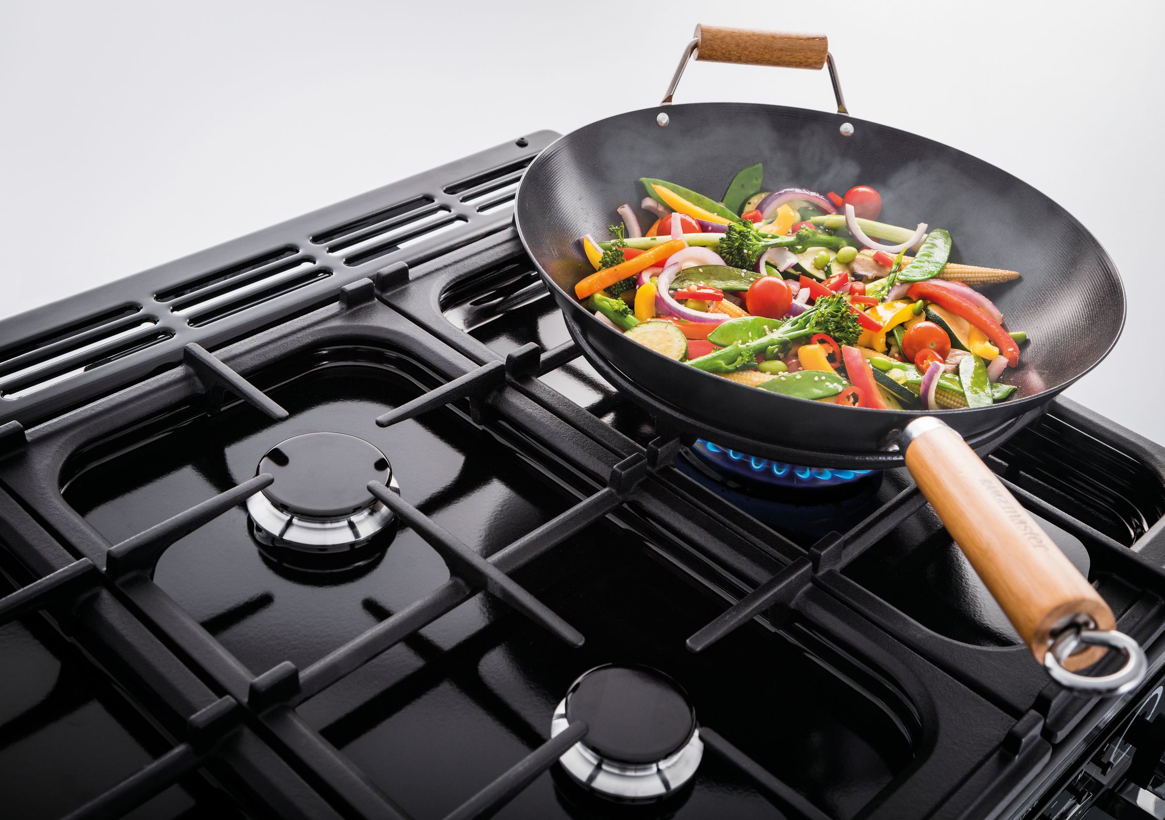 rangemaster cooker with a wok on the top