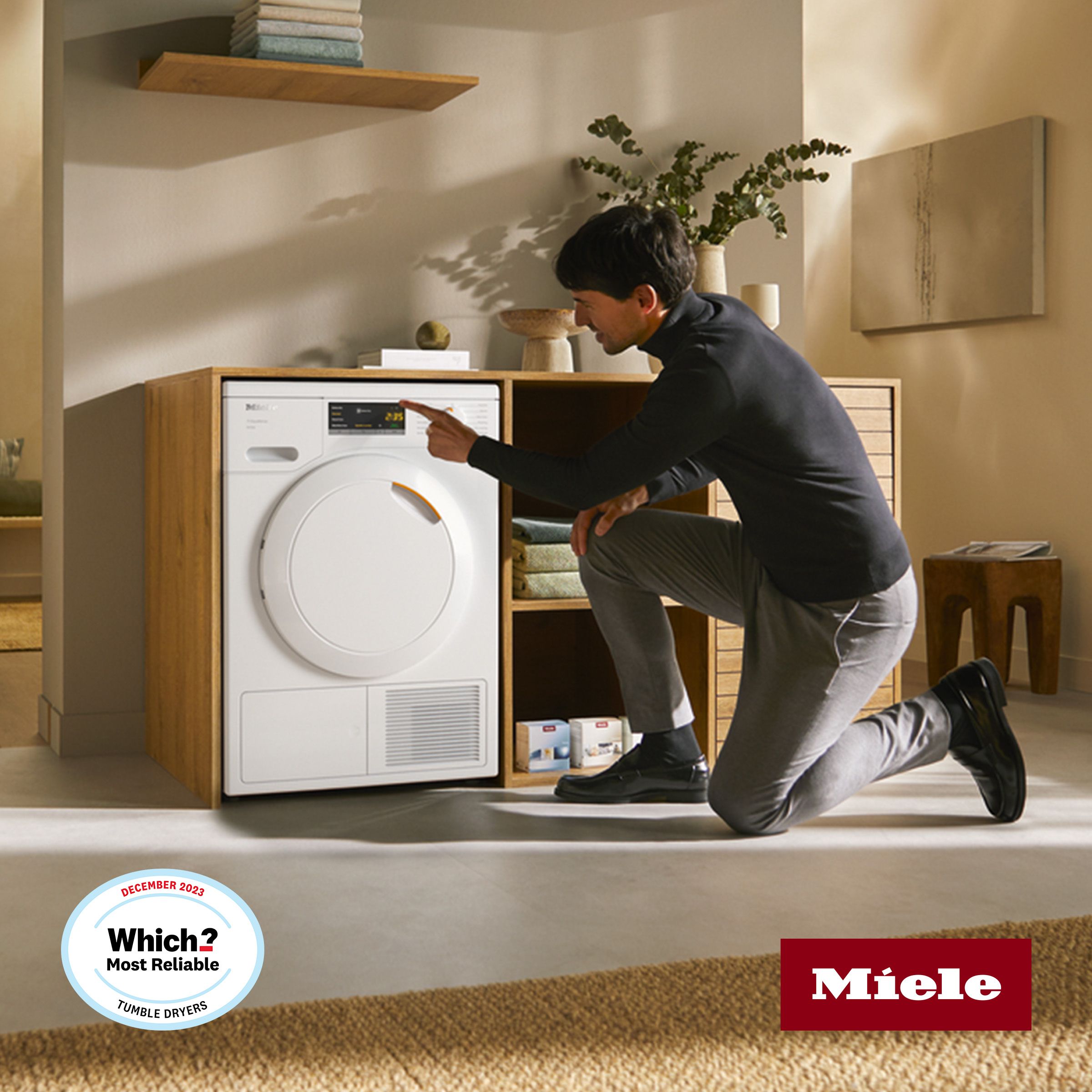 Man using a Miele washing machine