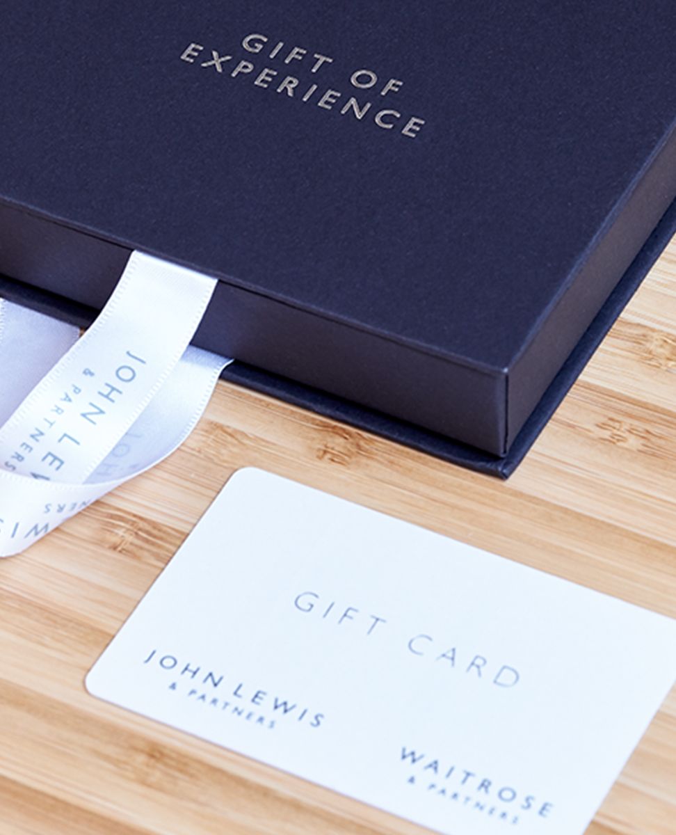 Close up photograph of a closed Gift Experience box and gift card 