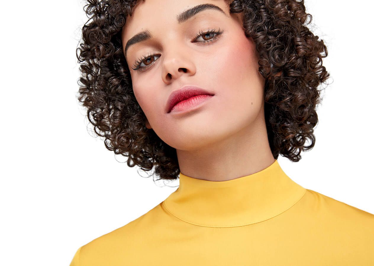 Model with blurred matte lipstick