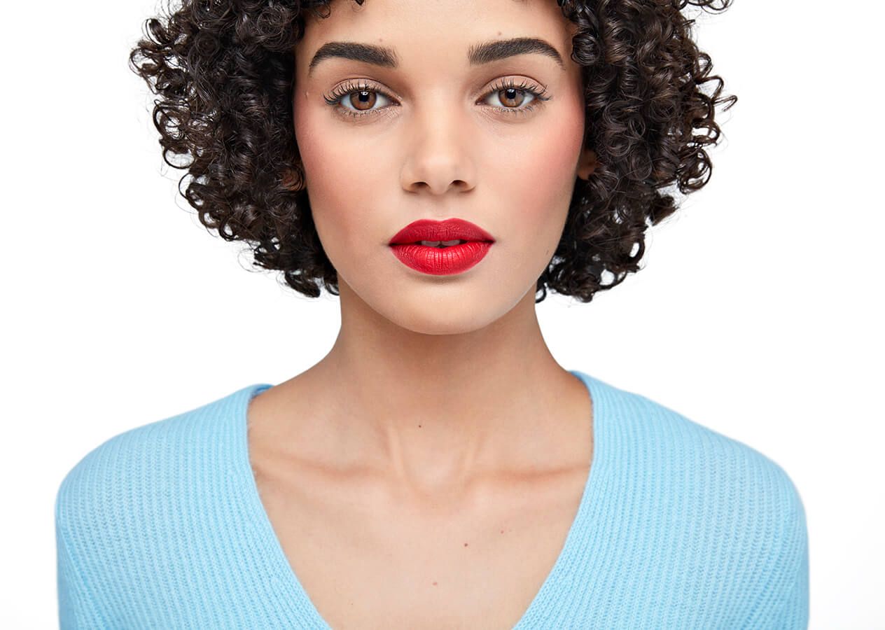 Model with bold red lipstick