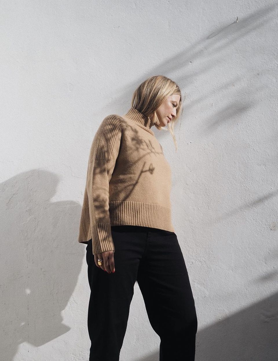 Alexis Foreman in a rollneck sweater by John Lewis & Partners