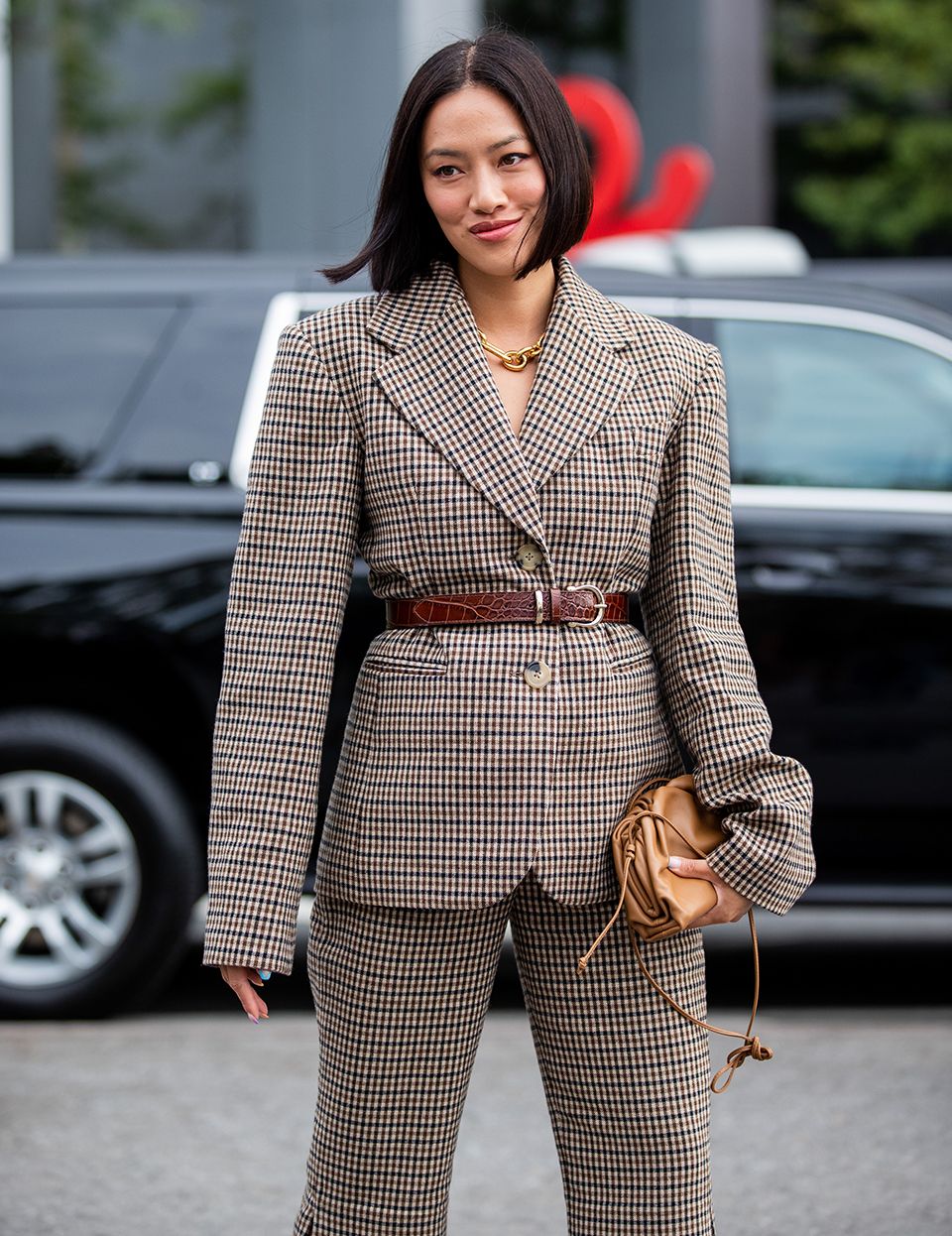 How to style a belt over a blazer