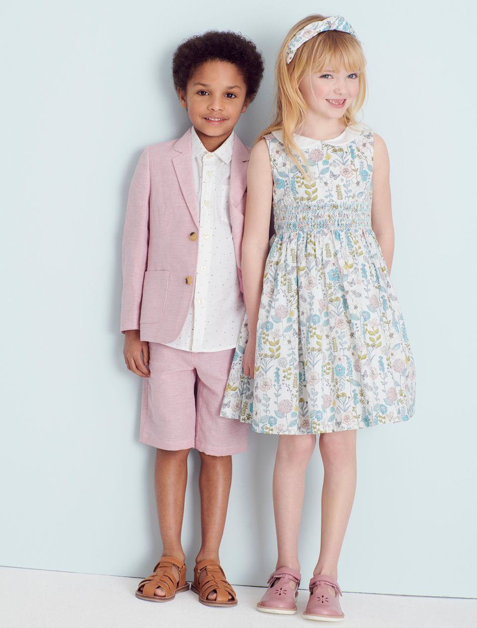 girl and boy in pastel outfits