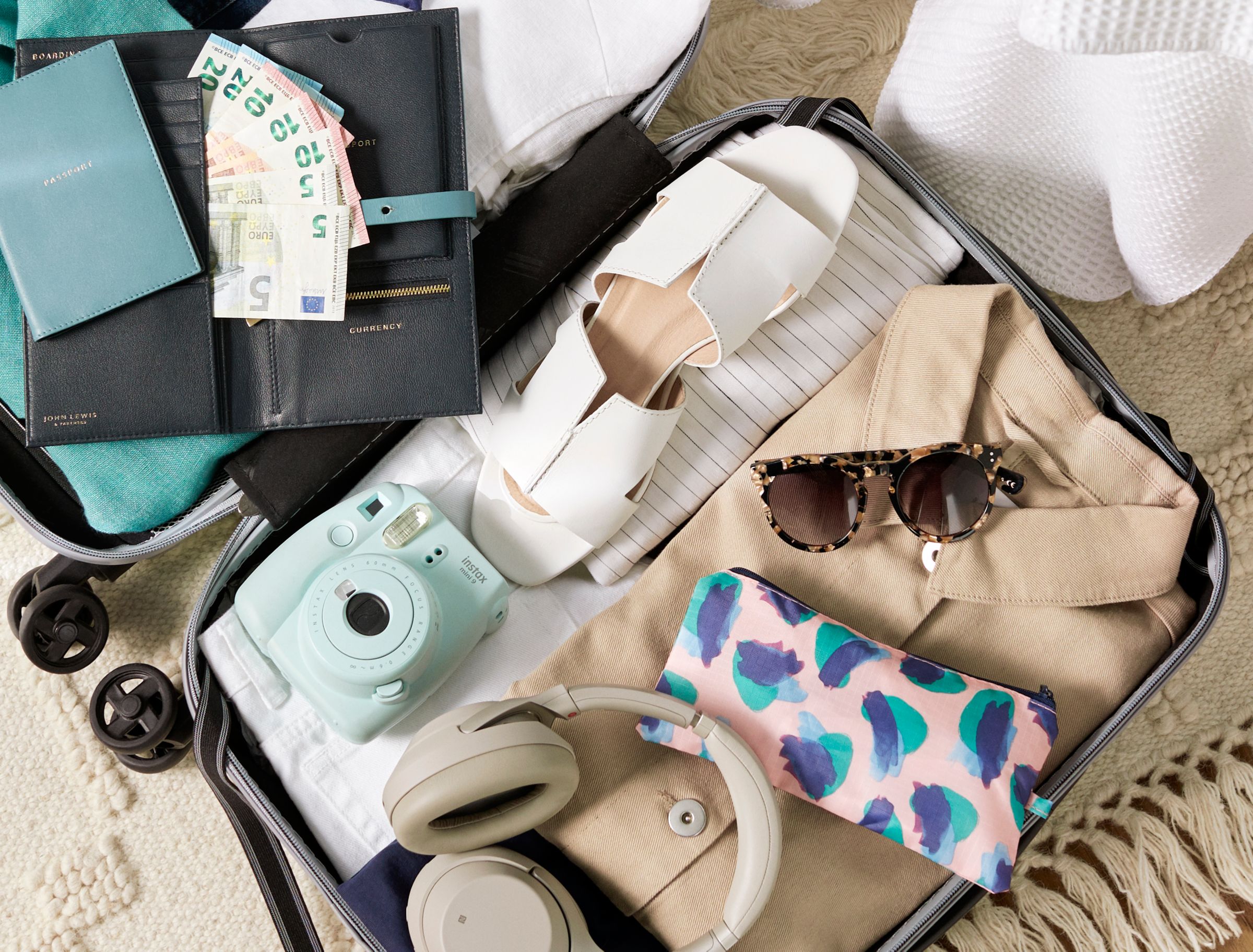 how to pack a suitcase with John Lewis & Partners