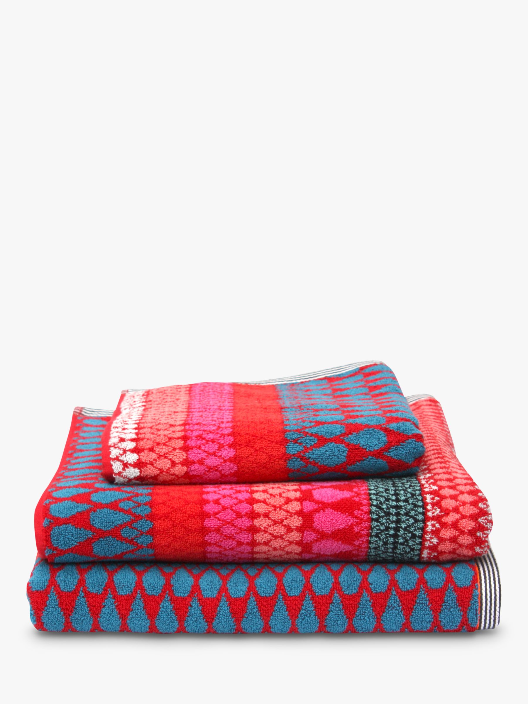red patterned bath towels