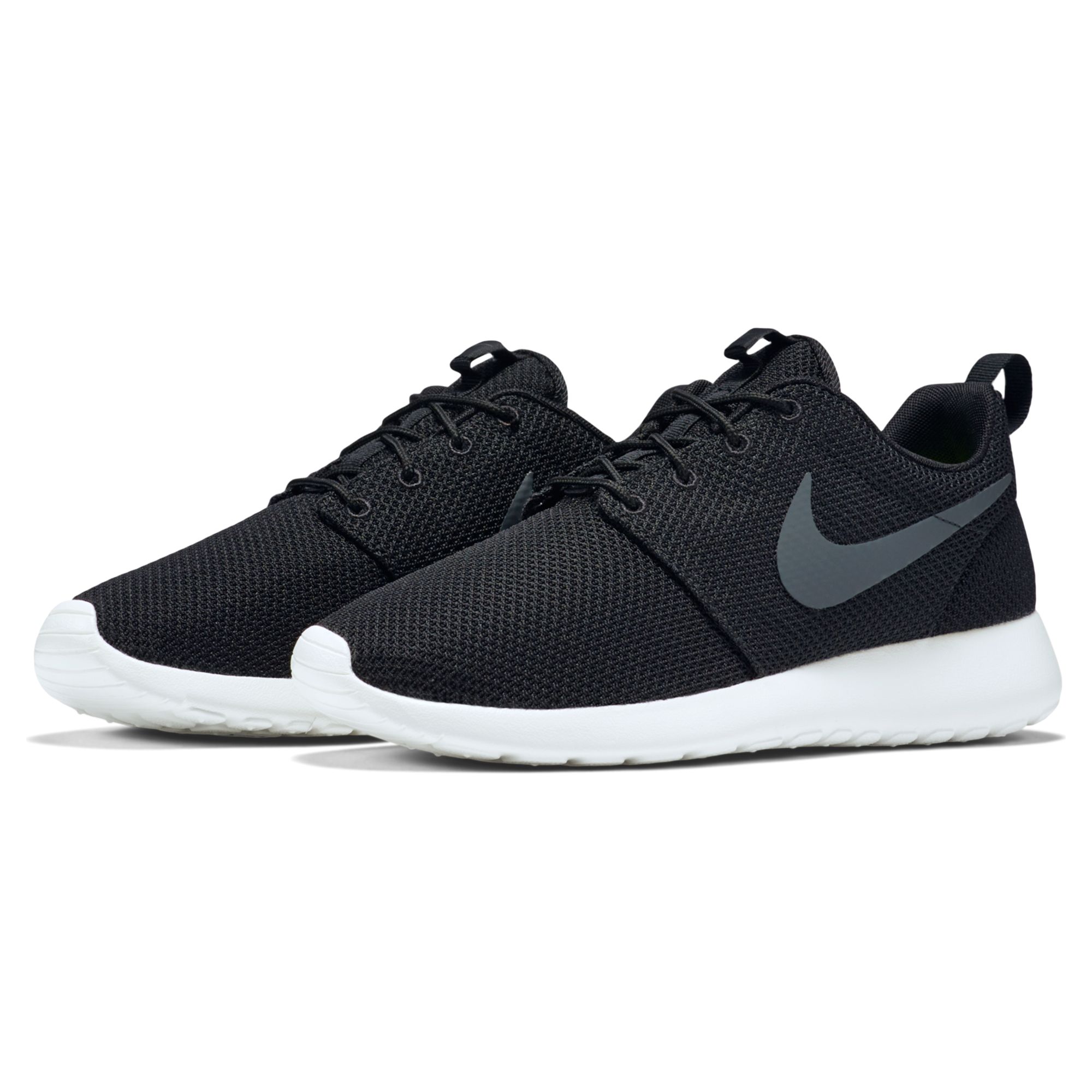 black nike trainers with white sole