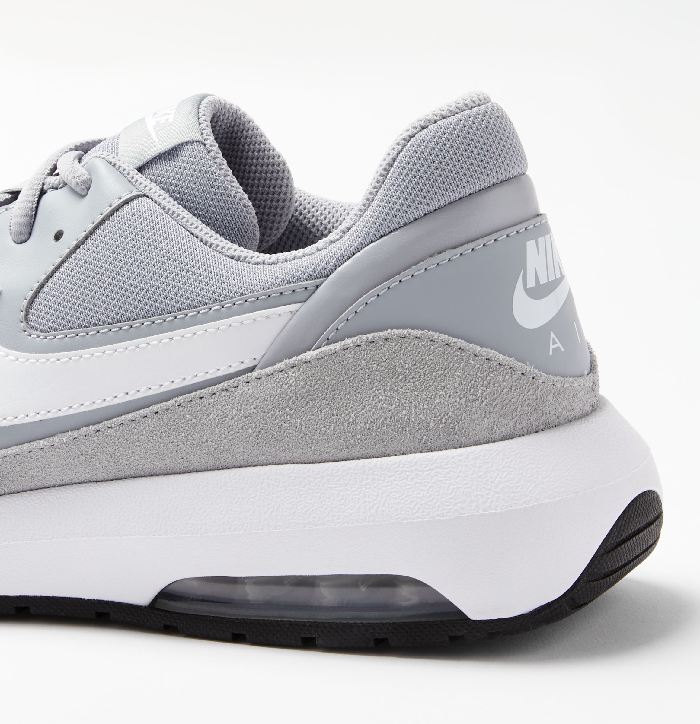 grey and blue nike trainers