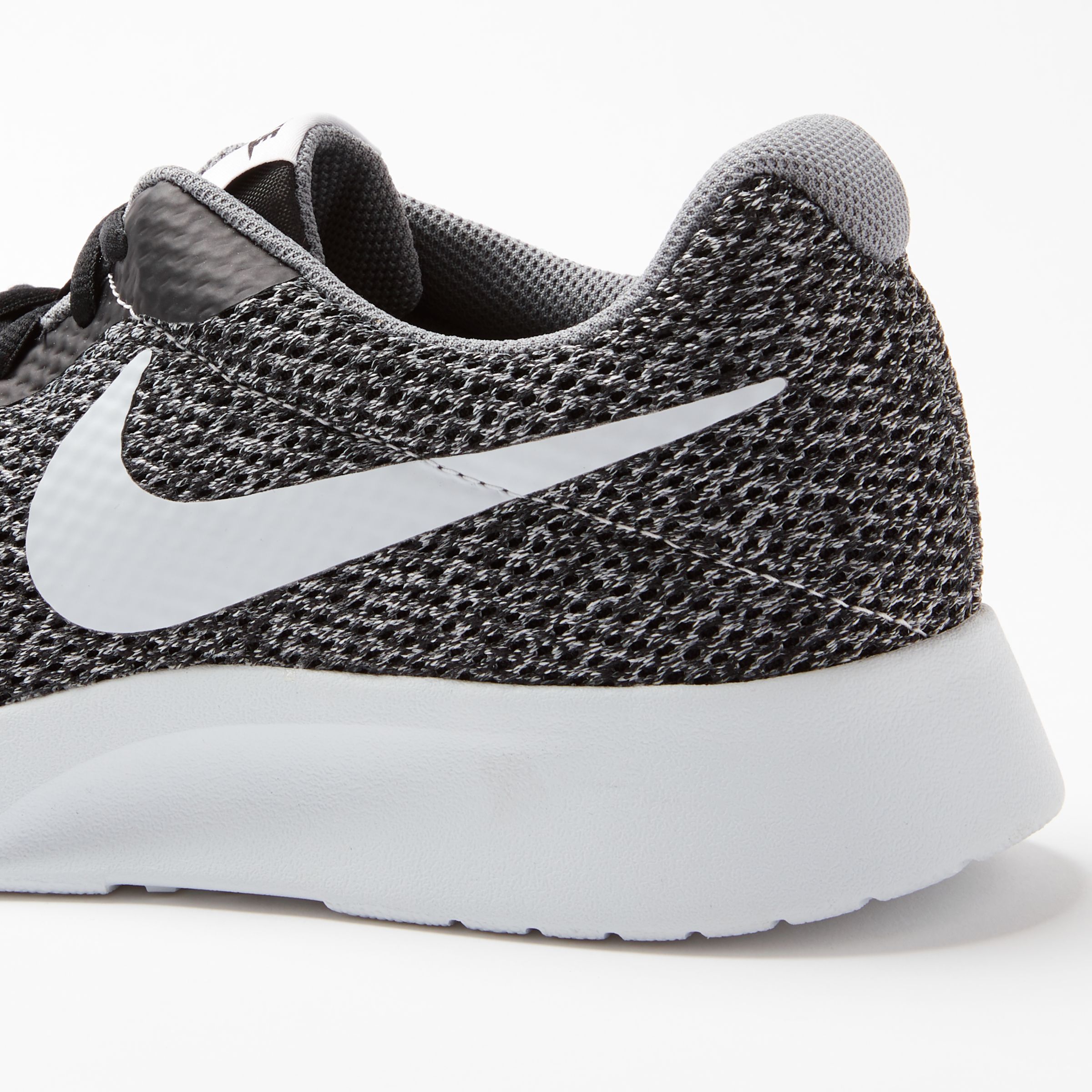 black and grey nike trainers