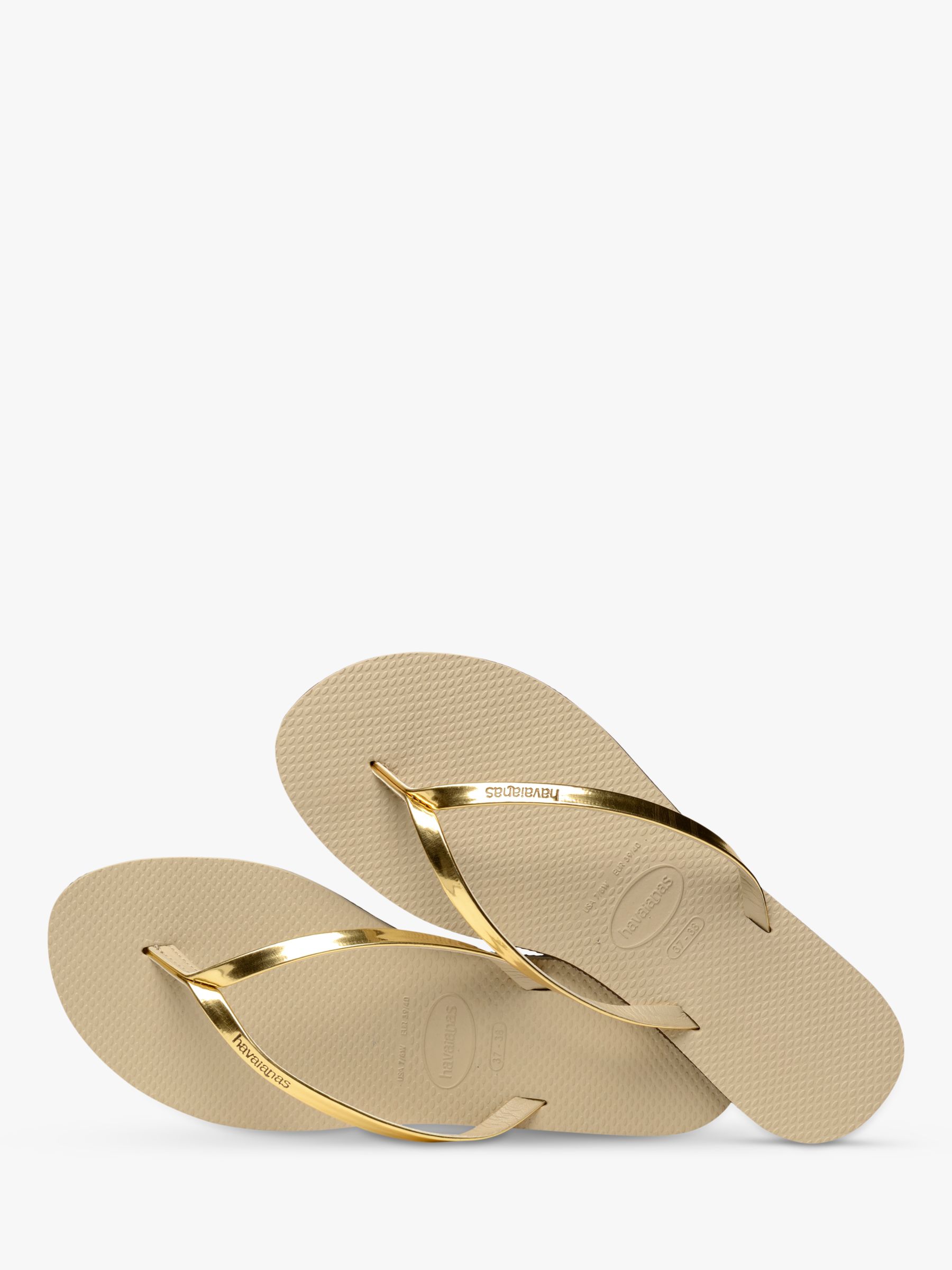 havaianas gold flip flops