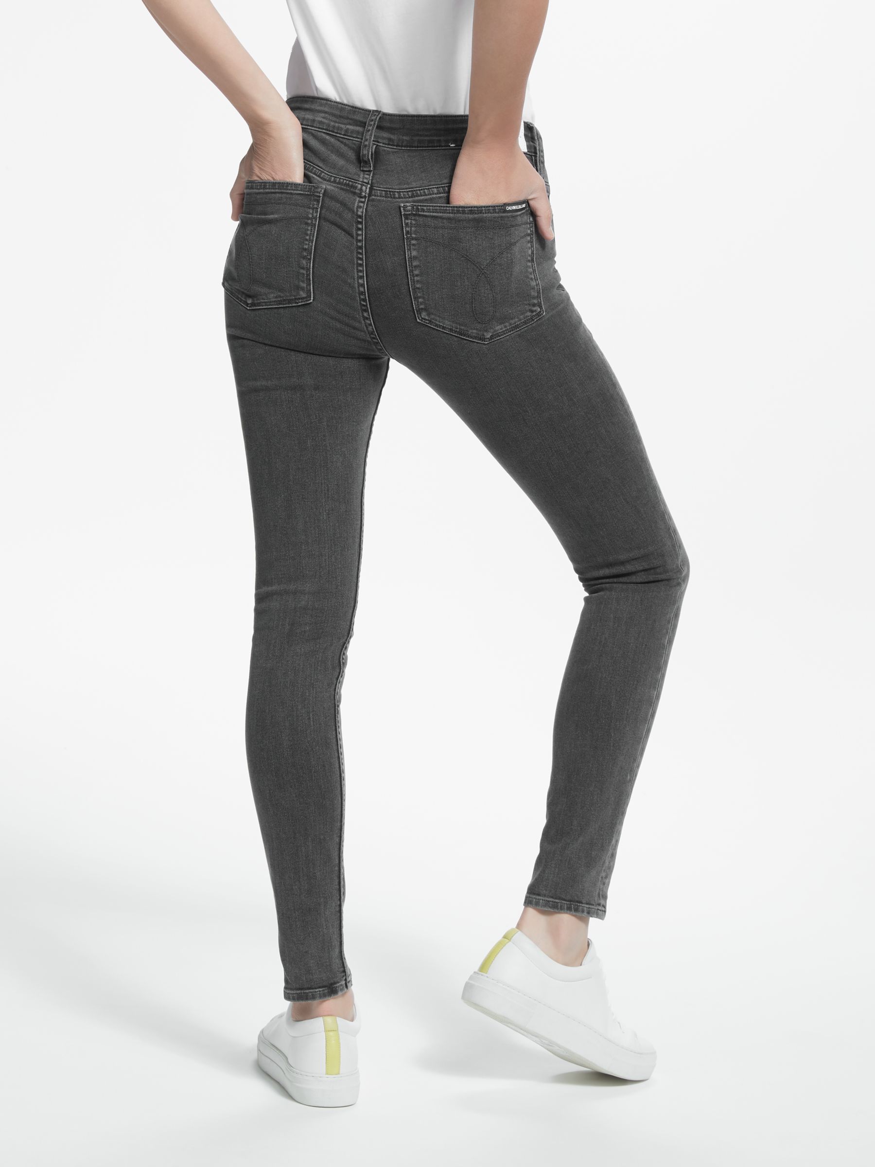 grey mid rise skinny jeans