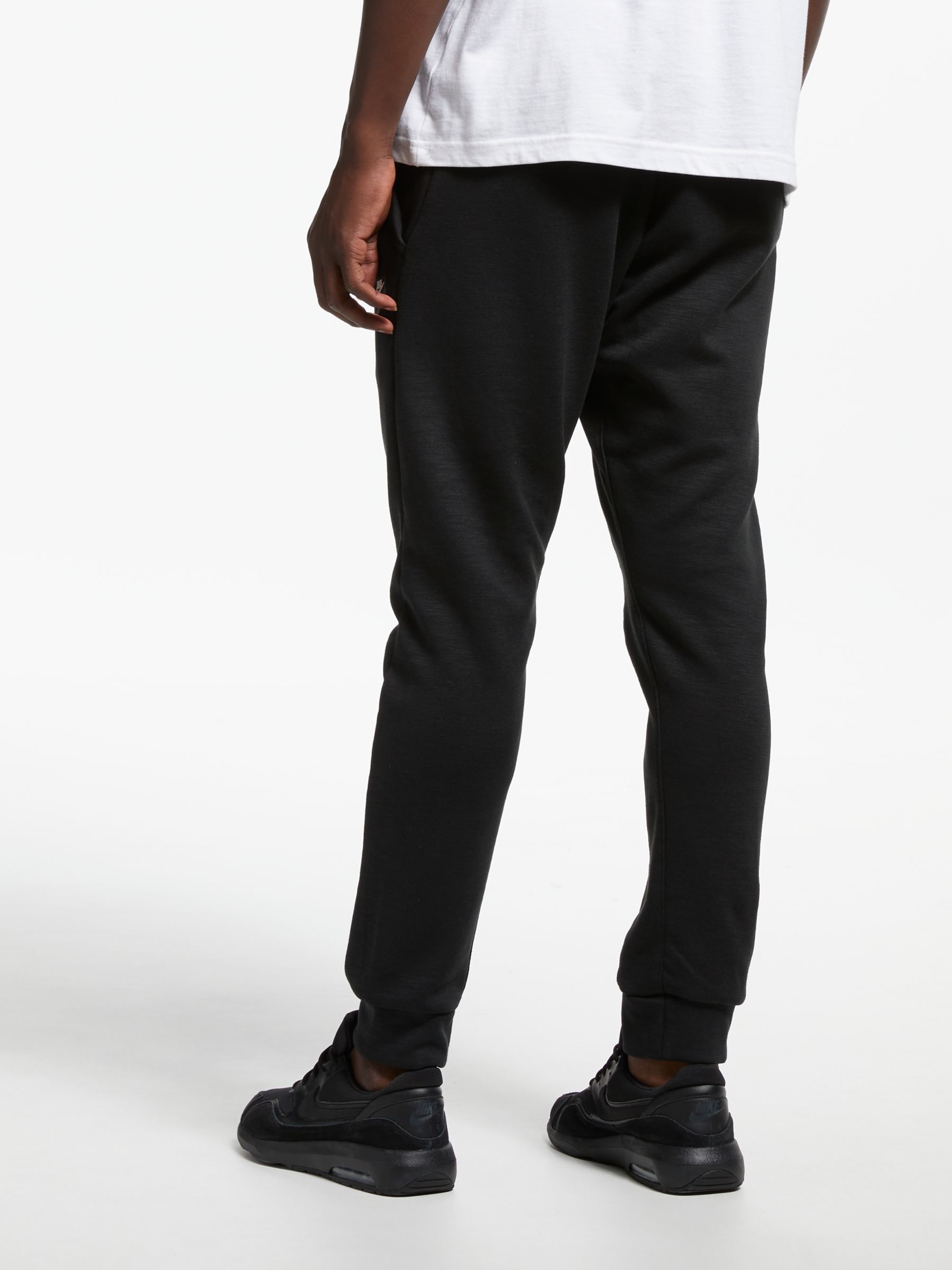 Nike Sportswear Optic Tracksuit Bottoms, Black at John Lewis & Partners
