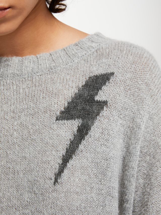 Jumper with outlet lightning bolt