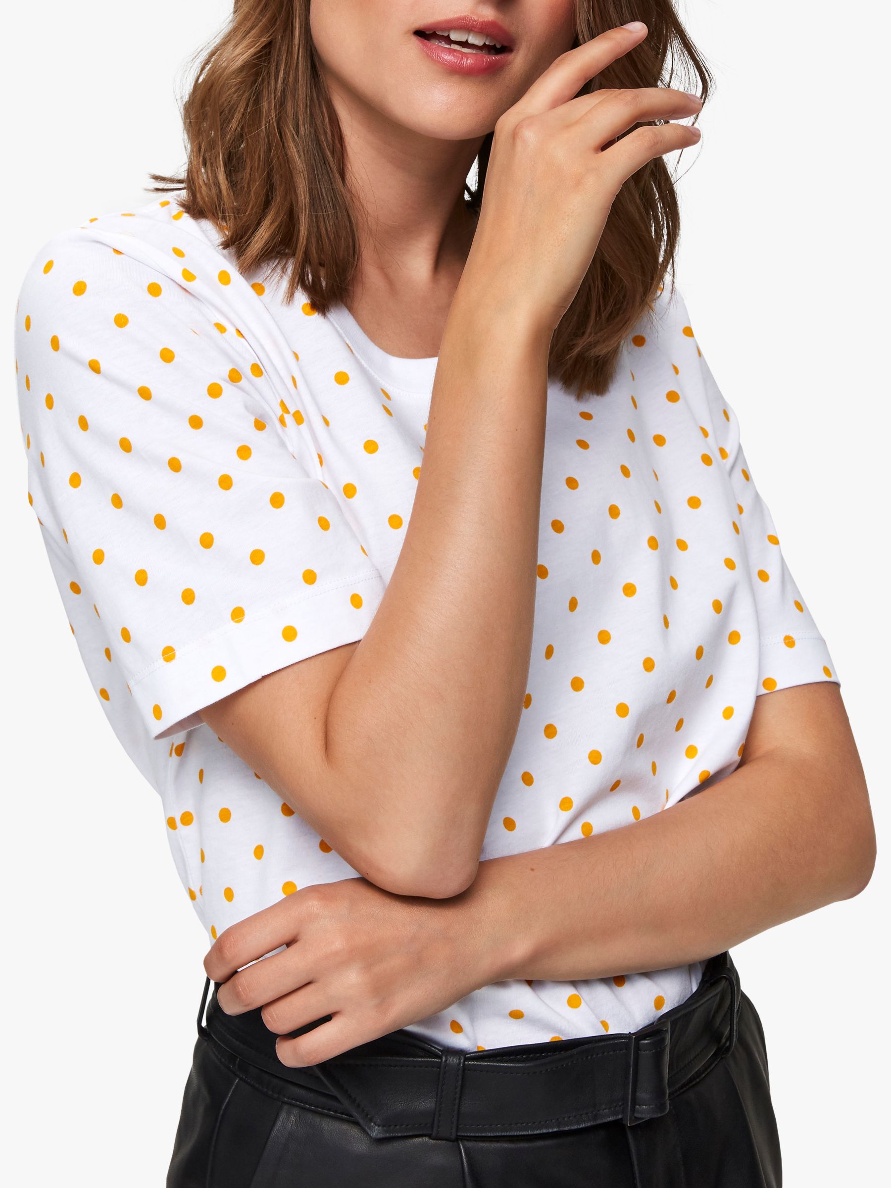 yellow and white polka dot shirt