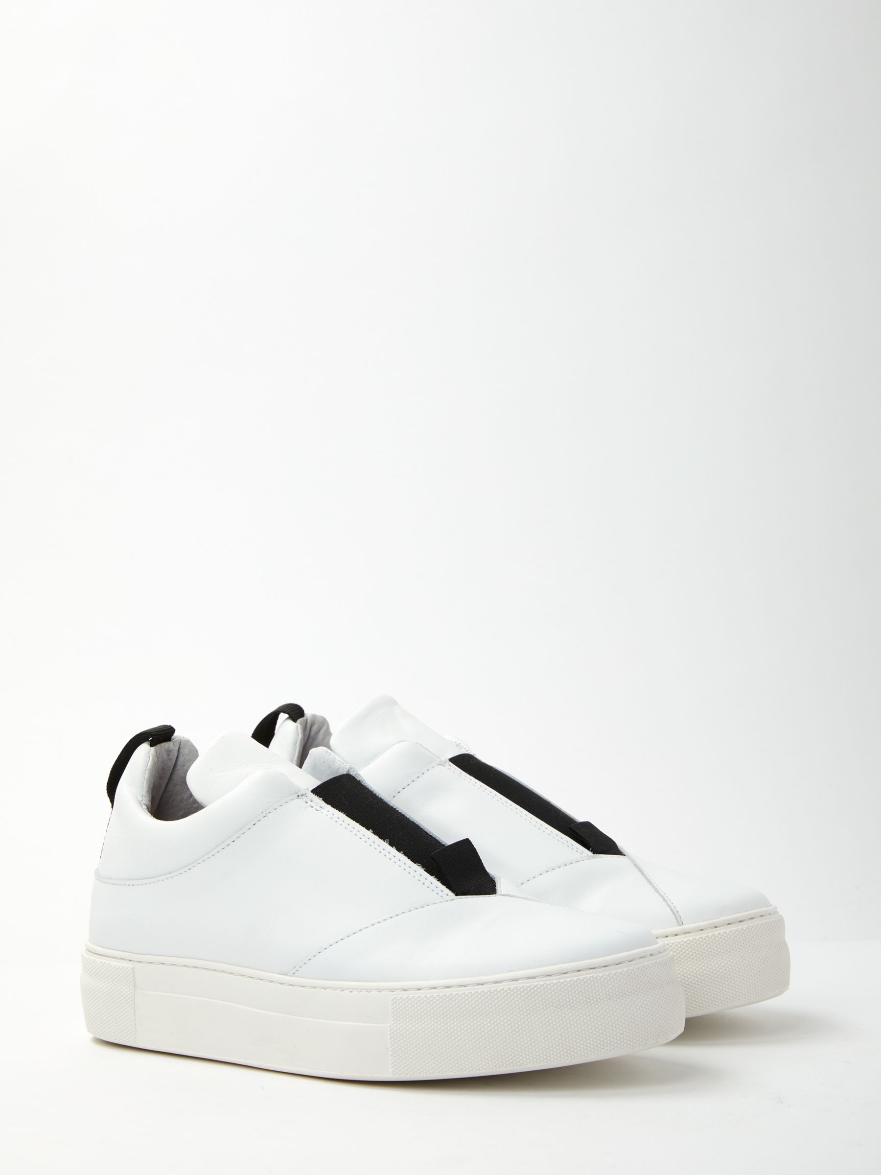 white leather slip on trainers womens