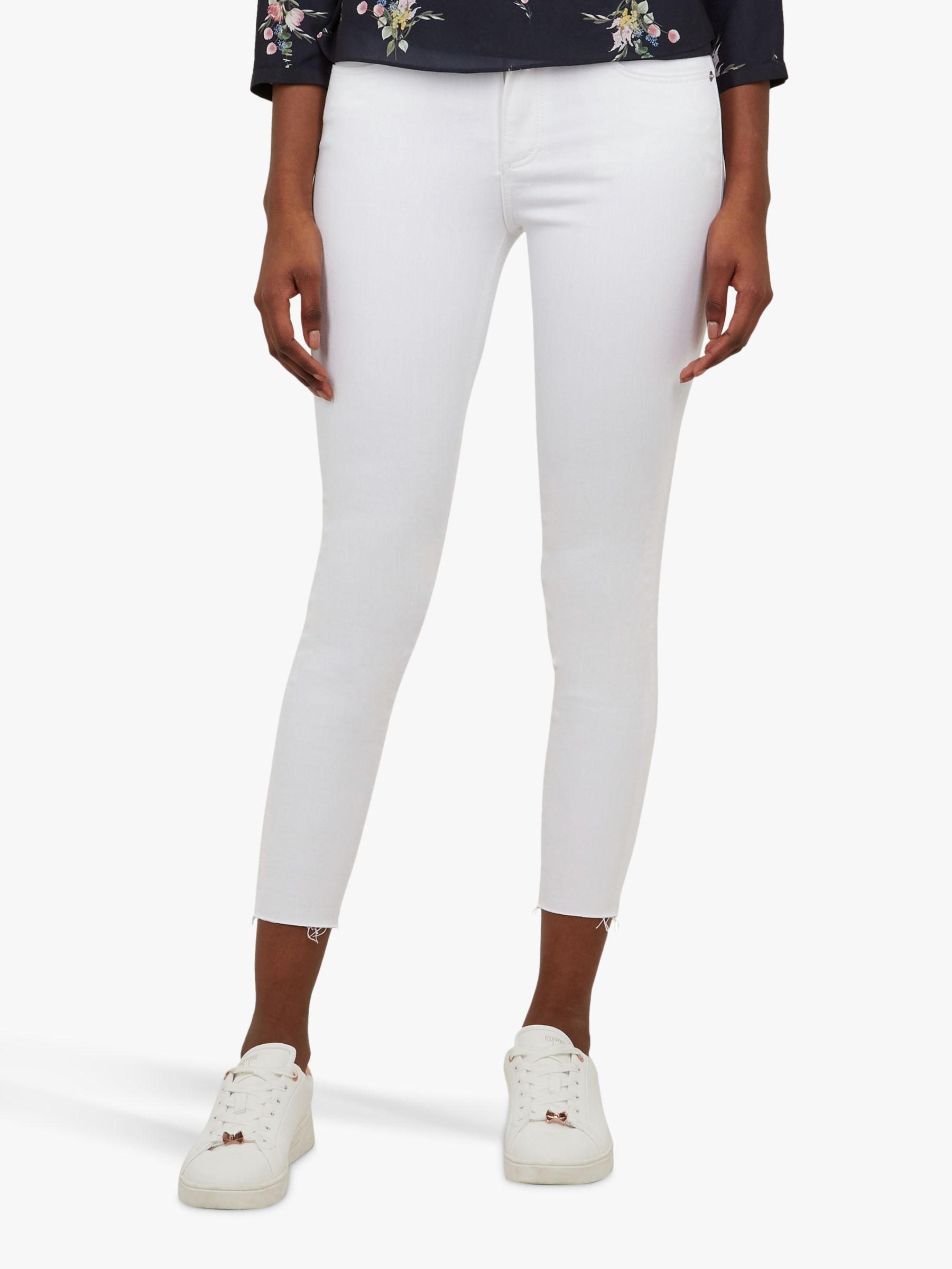 white frayed skinny jeans