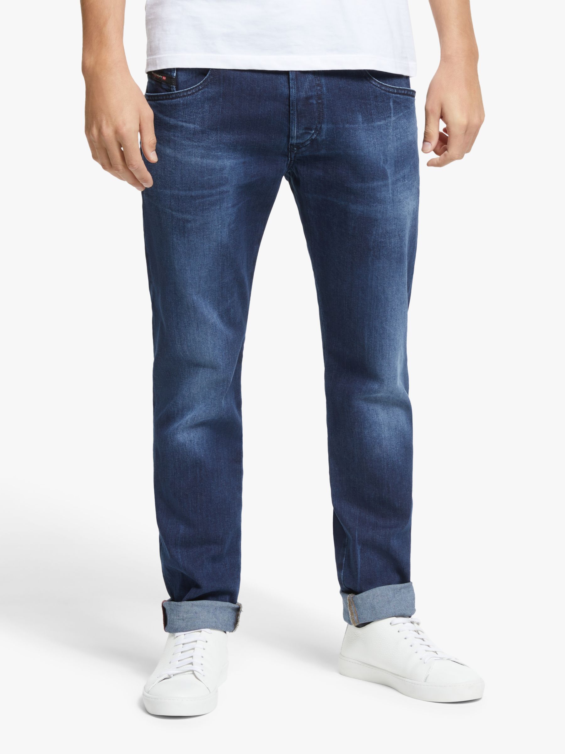 mens dark blue tapered jeans