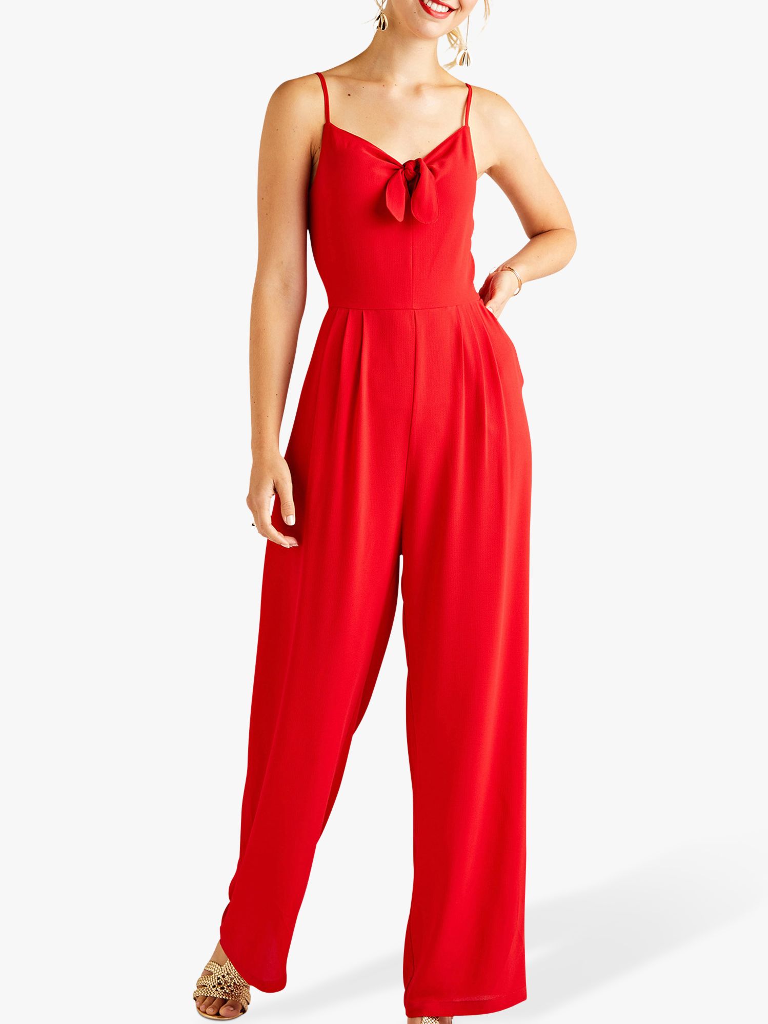 red sleeveless jumpsuit