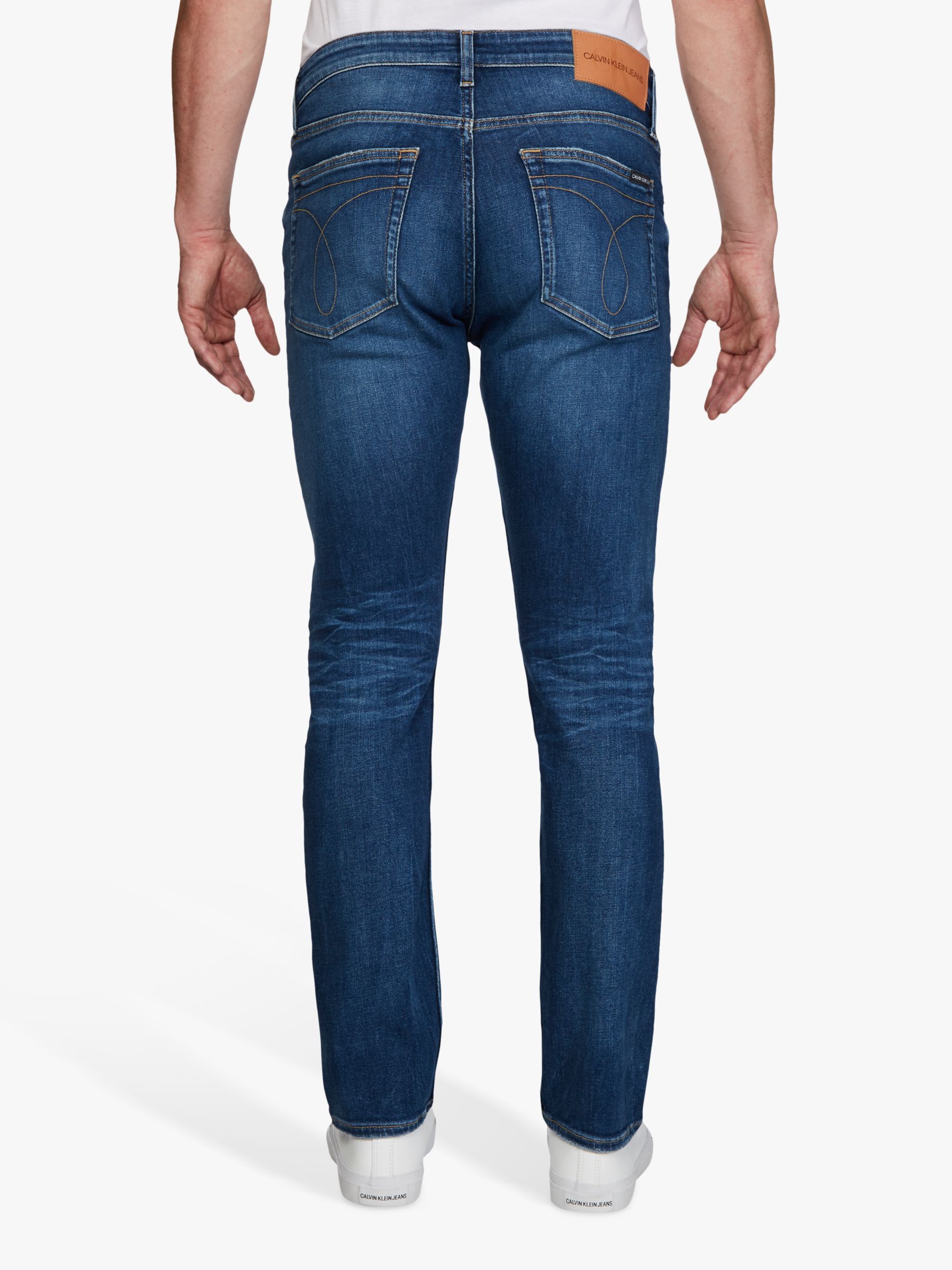 Calvin Klein Jeans 026 Slim Fit Jeans, DA142 Mid Blue at John Lewis ...
