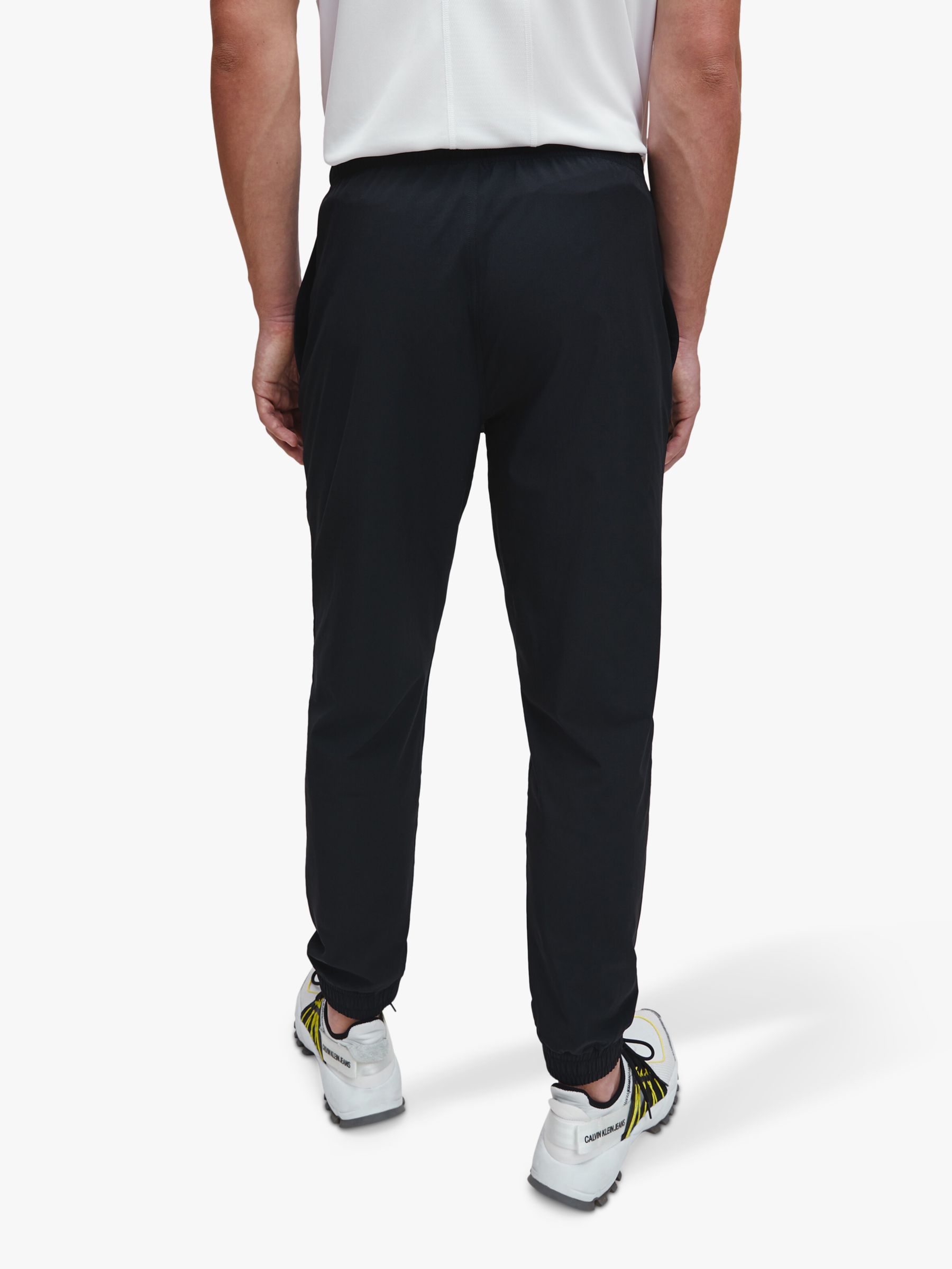 Calvin Klein Performance Woven Trousers, Black at John Lewis & Partners