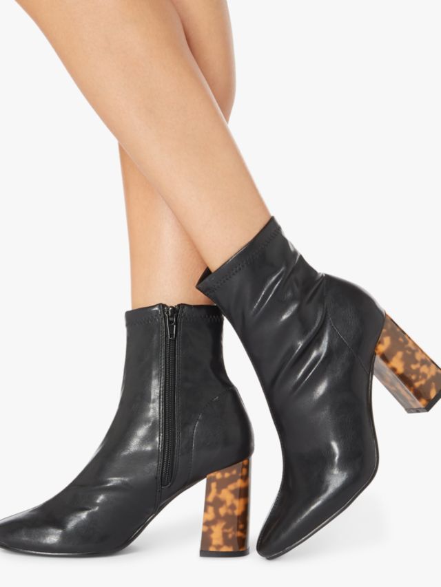 black boots with tortoise heel