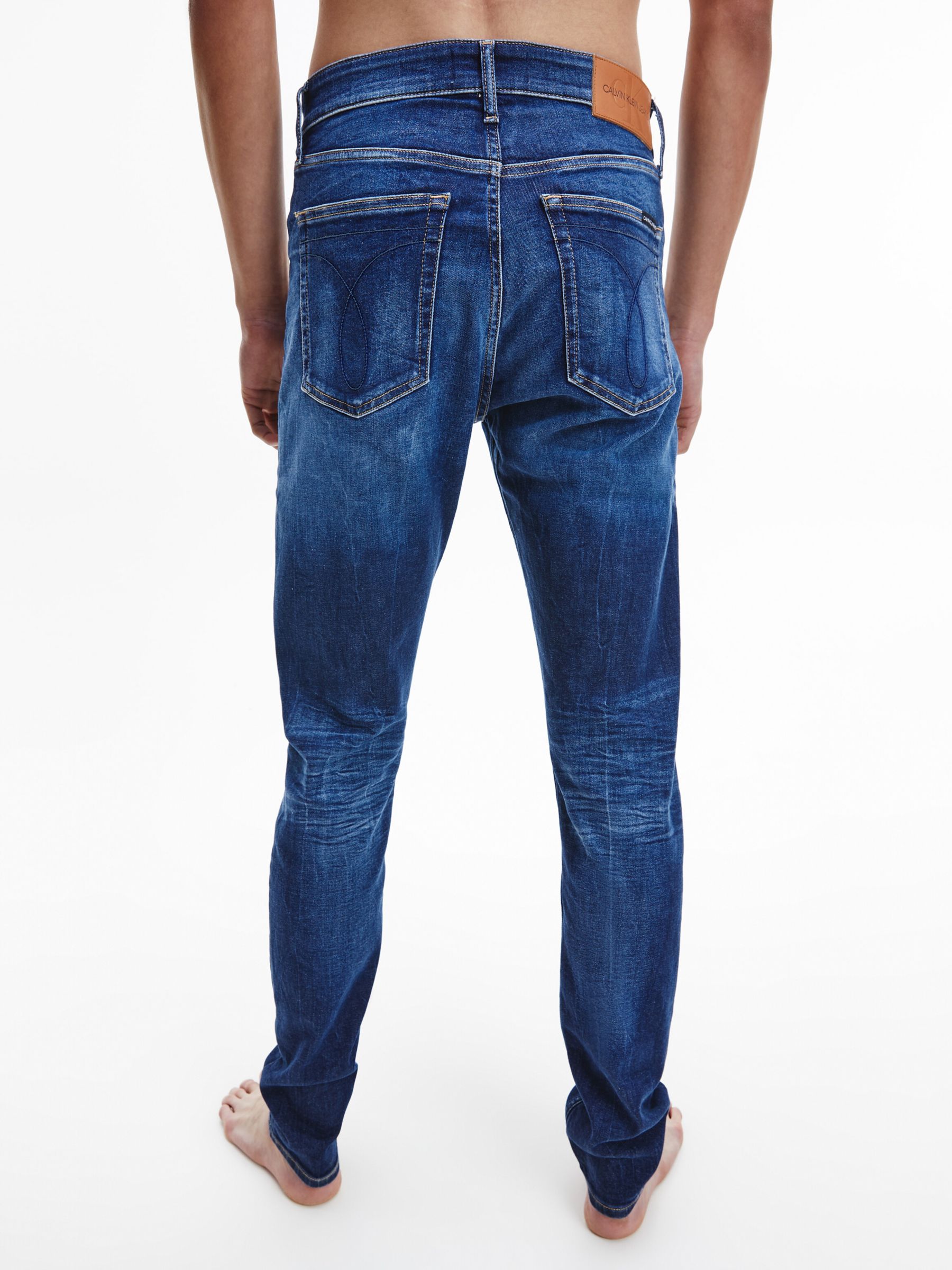 Calvin Klein Jeans SLIM TAPER - Slim fit jeans - dark blue/dark-blue denim  