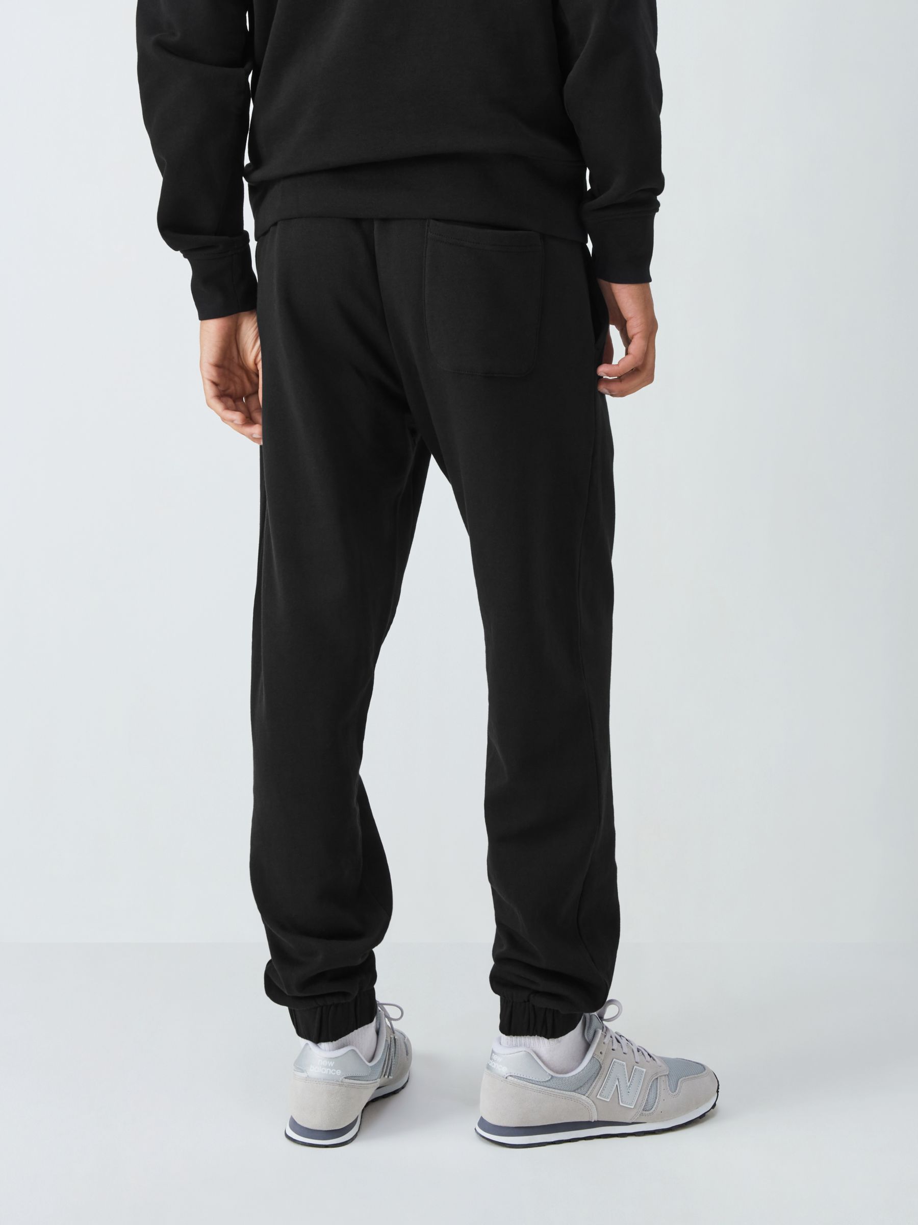 Black joggers best sale with straps