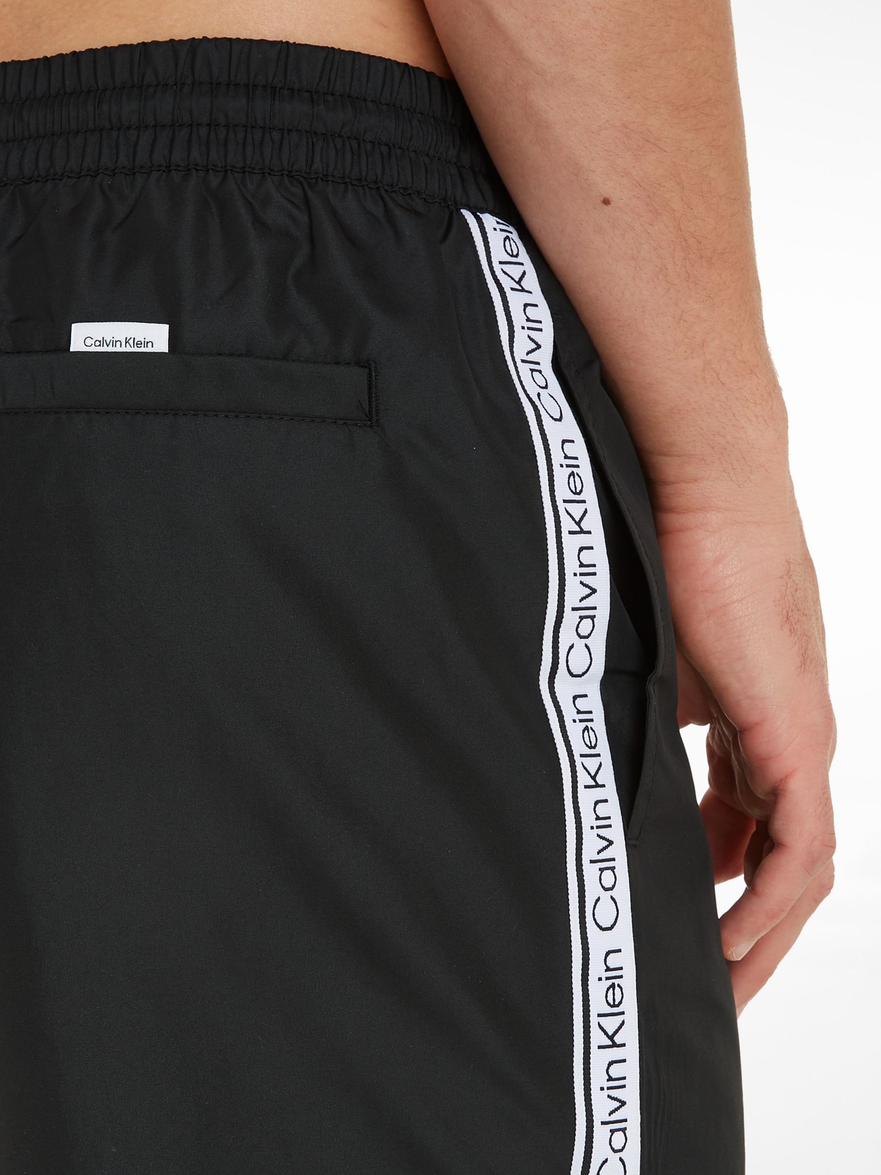 Calvin Klein Core Logo Tape Recycled Swim Shorts, Black at John Lewis ...