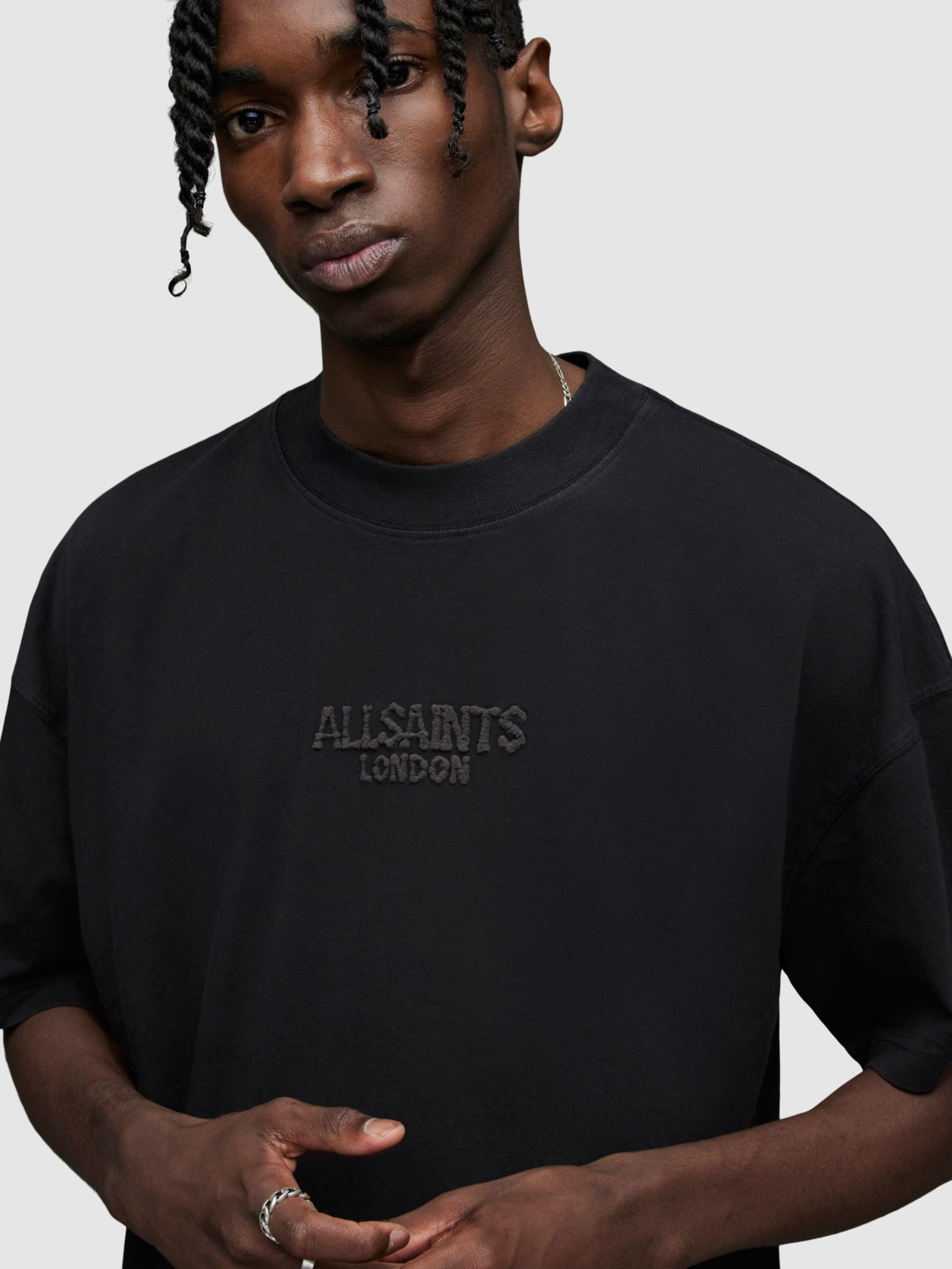 AllSaints Bones Textured Logo Oversized T-Shirt, Washed Black at John ...