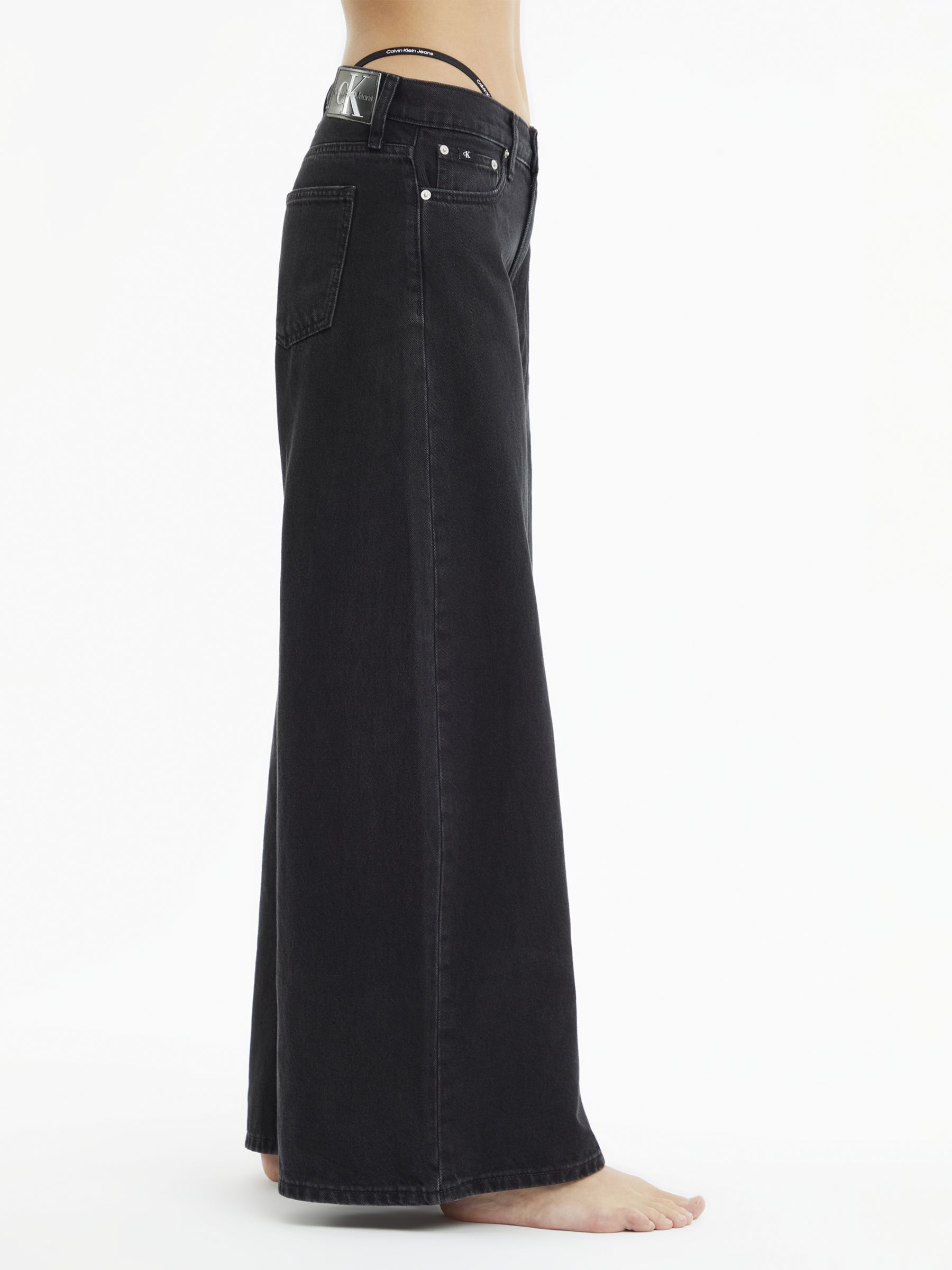 Buy Calvin Klein Low Rise Relaxed Jeans, Black Online at johnlewis.com