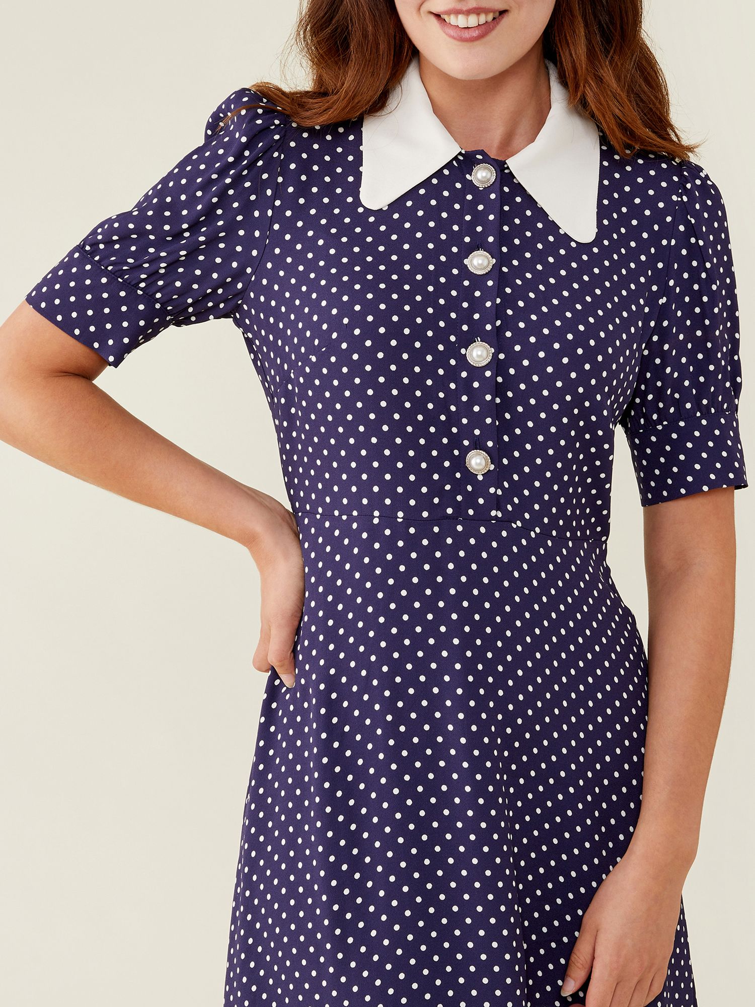 Navy polka dot dress with sales white collar