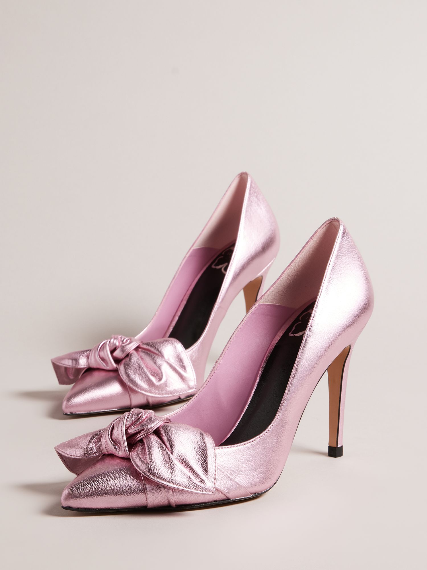 light pink high heels with bow