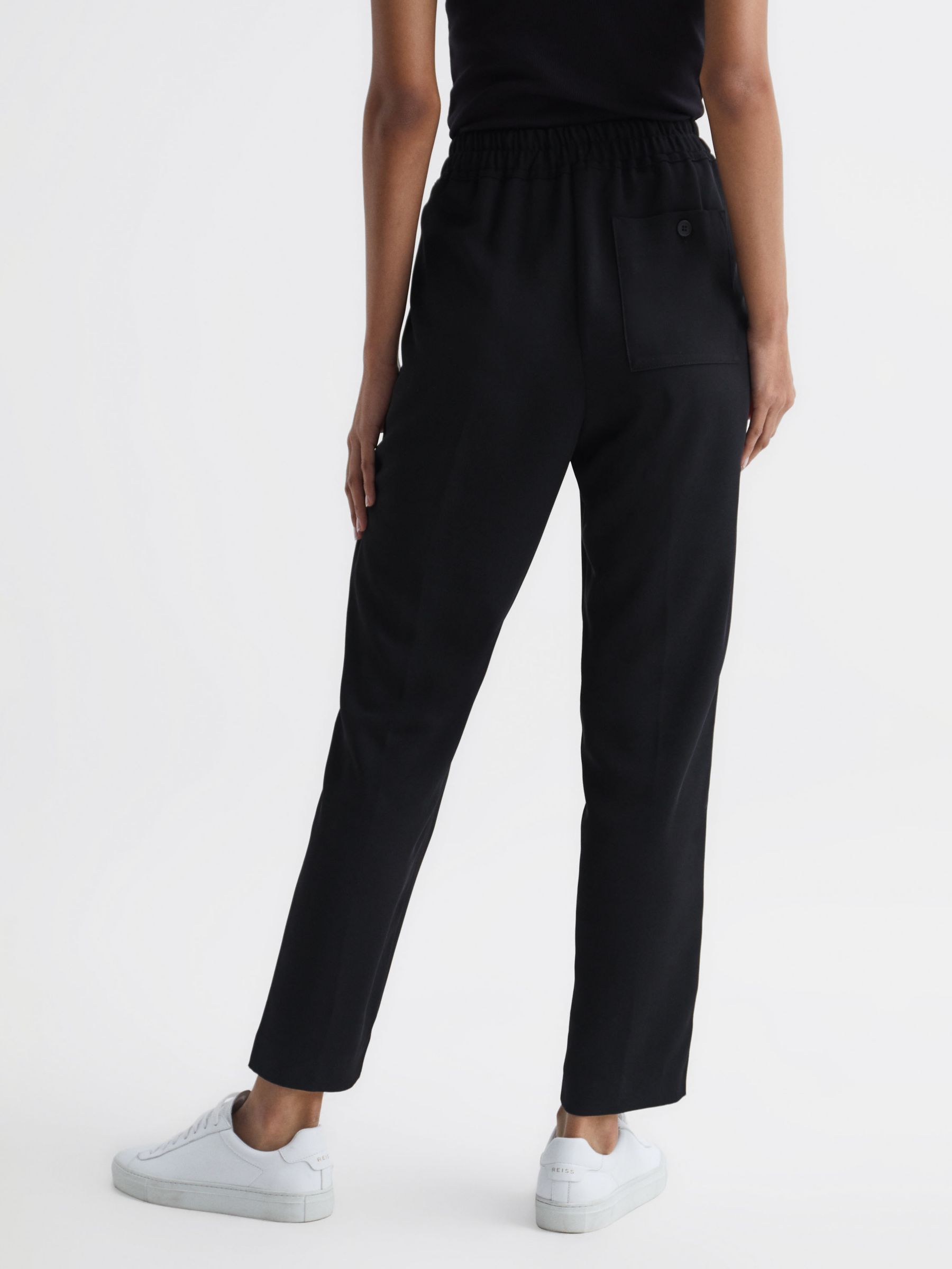 Buy Reiss Black Olivia Tapered Contrast Waistband Trousers from Next Spain