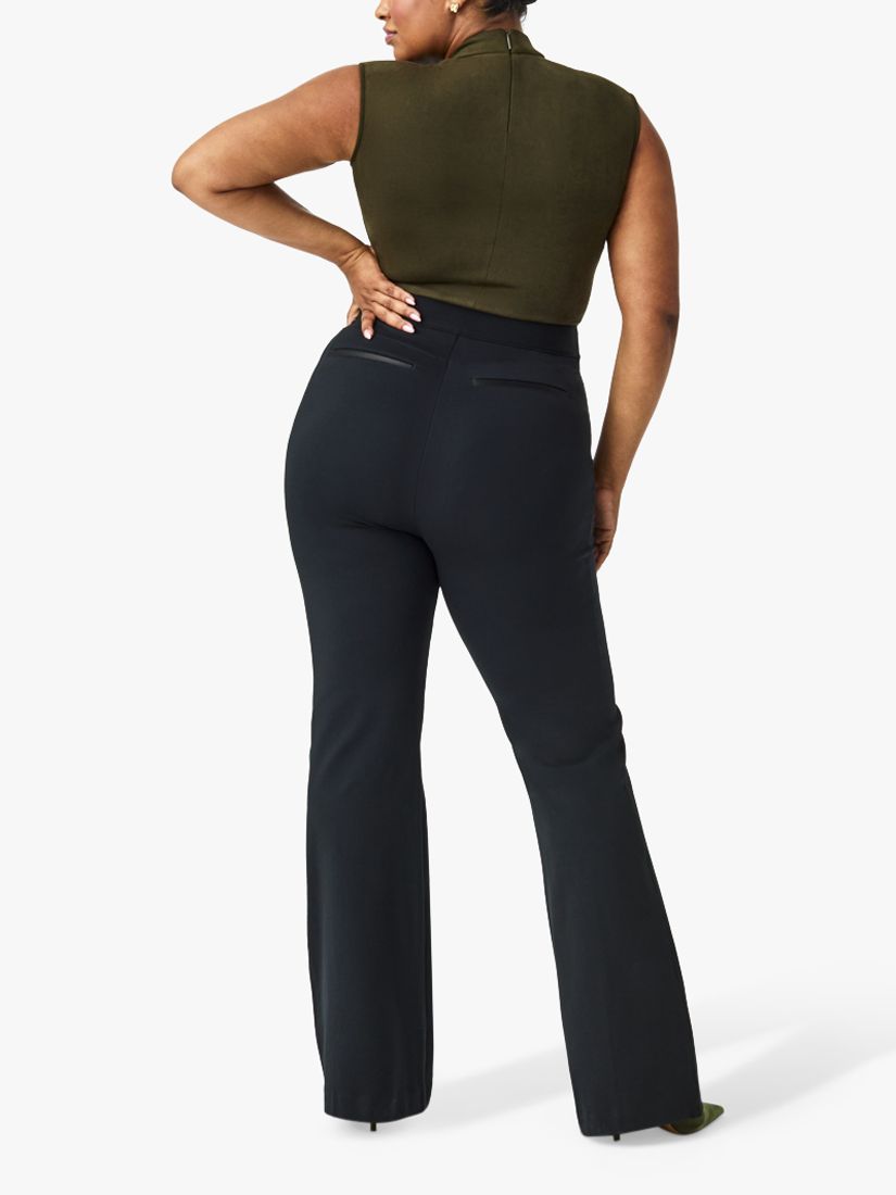 High-rise flared pants in black - Area
