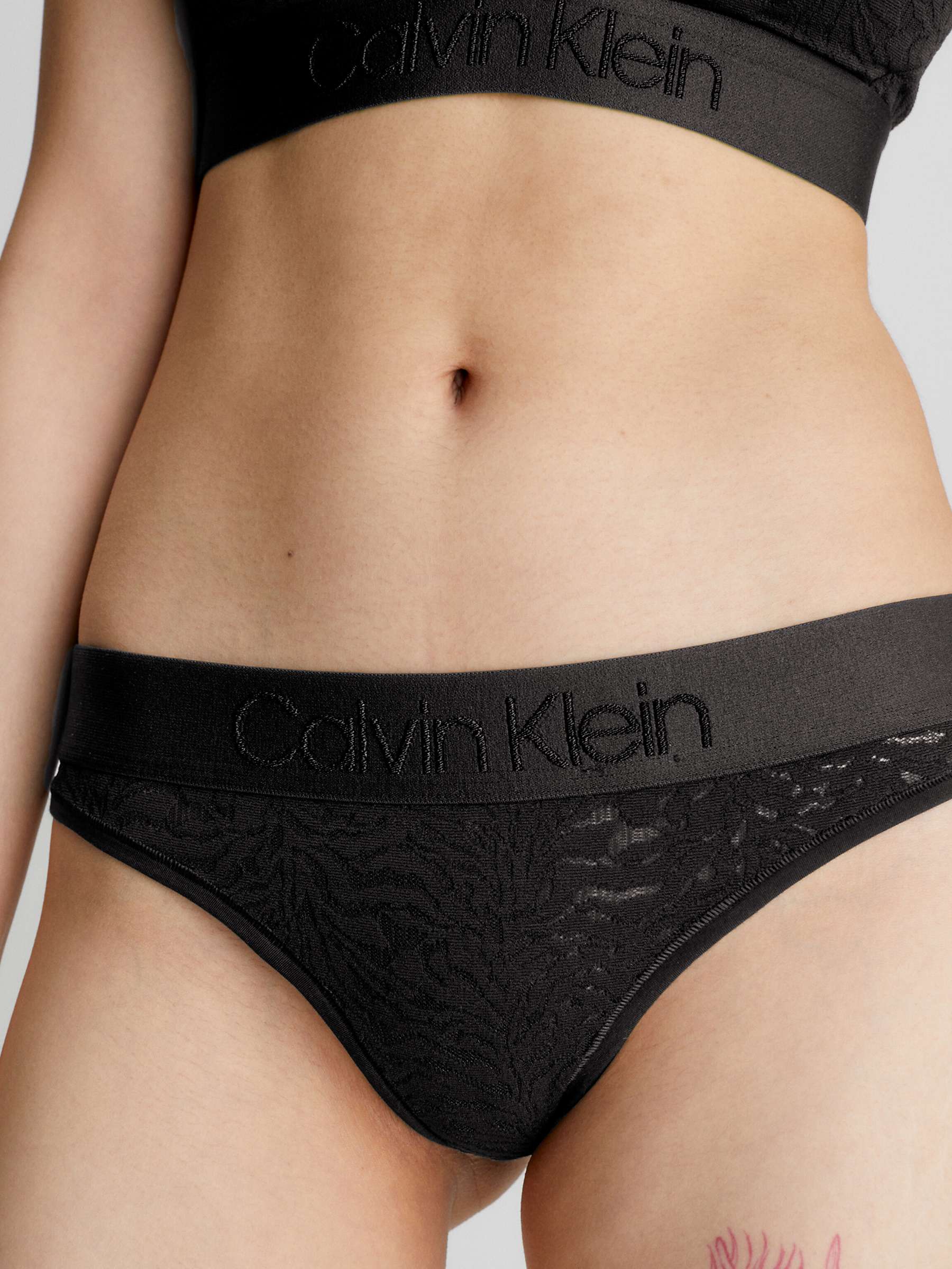 Buy Calvin Klein Instrinsic Thong, Black Online at johnlewis.com