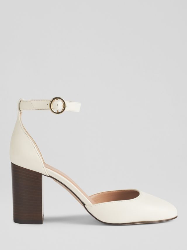 Two piece store block heel pump