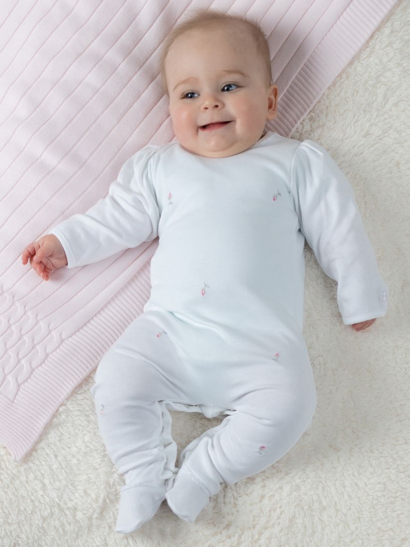 White newborn best sale baby grows