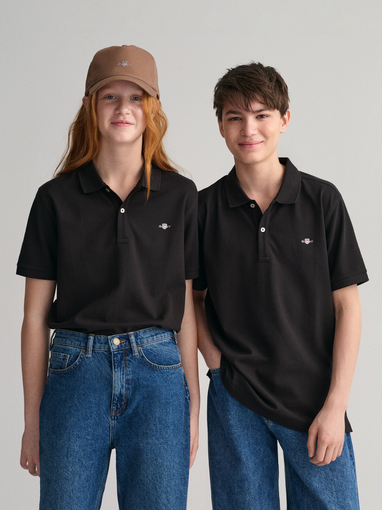 GANT Kids' Unisex Pique Polo Shirt, Black at John Lewis & Partners