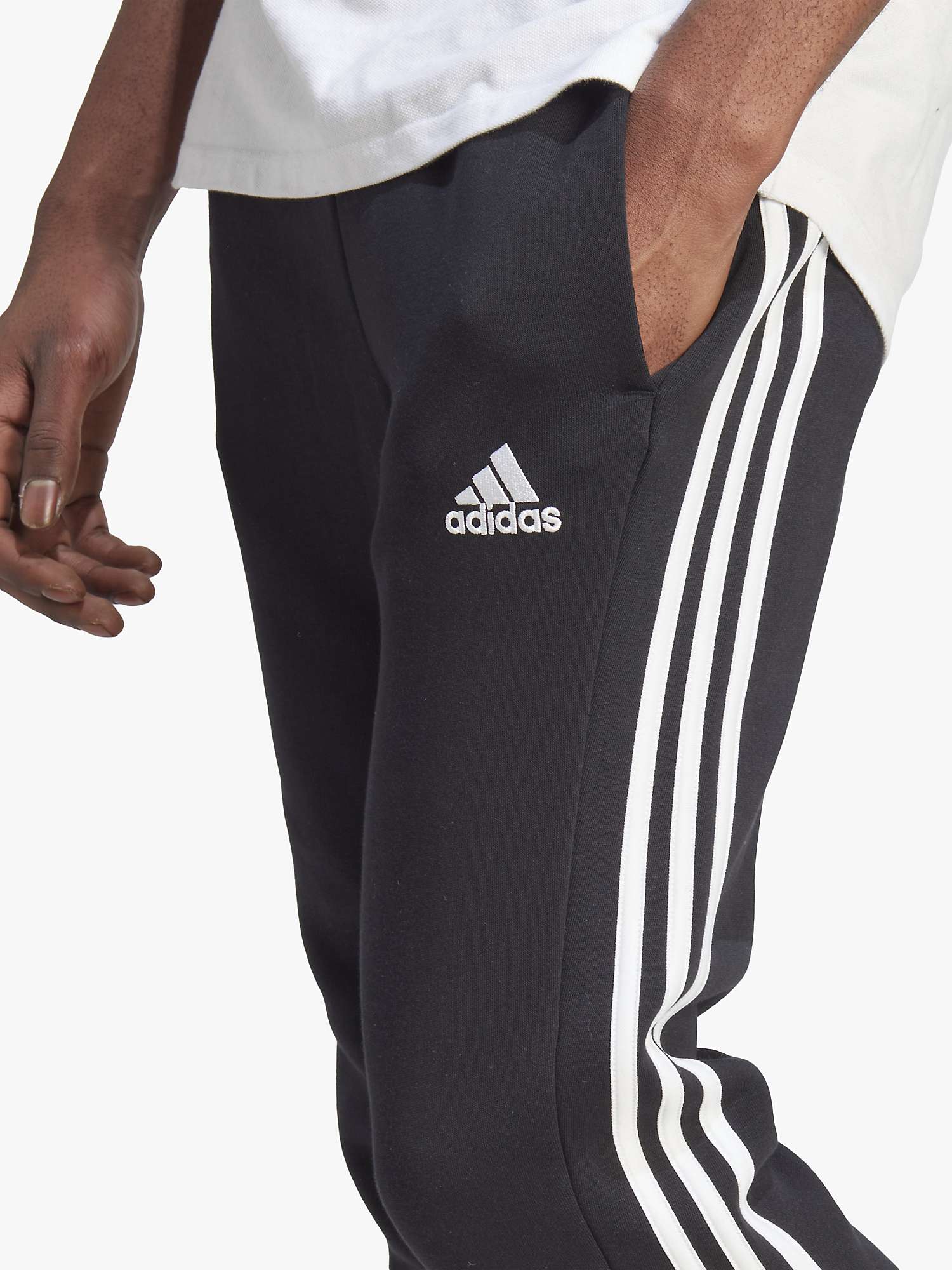 Buy adidas Essentials 3-Stripes Fleece Tapered Cuff Jogger, Black/White Online at johnlewis.com