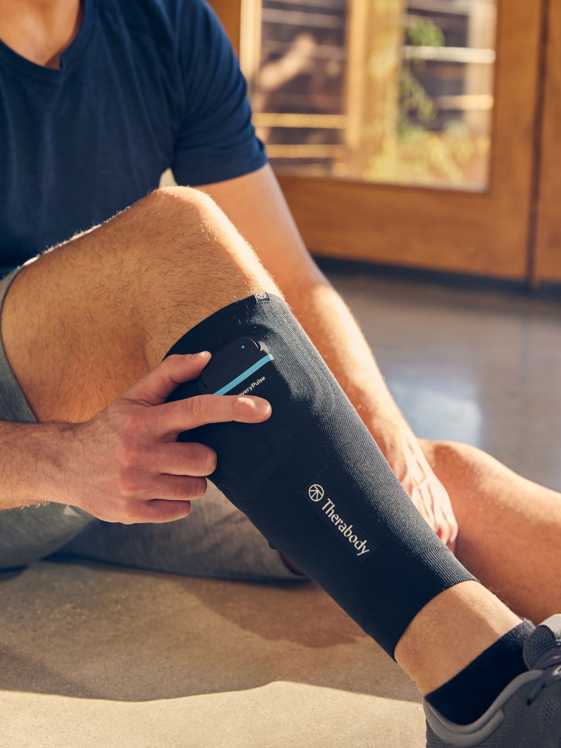 Therabody RecoveryPulse Calf Vibrating Compression Sleeve, Black, XS