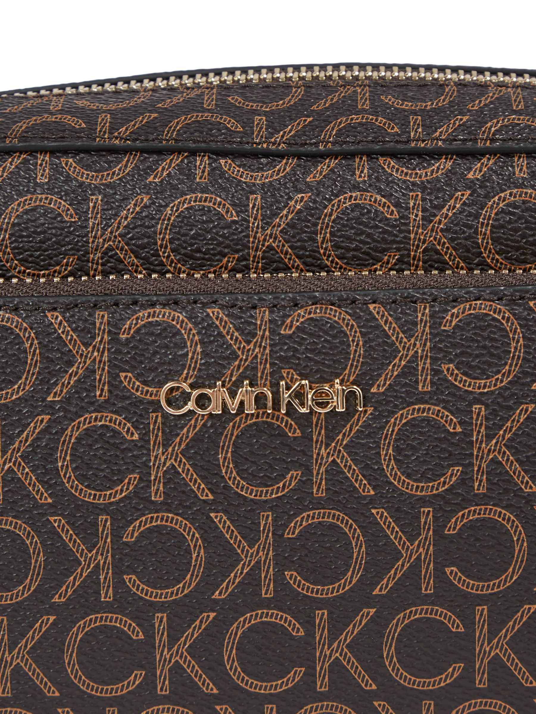 Calvin Klein Monogram Print Leather Crossbody Bag in Brown