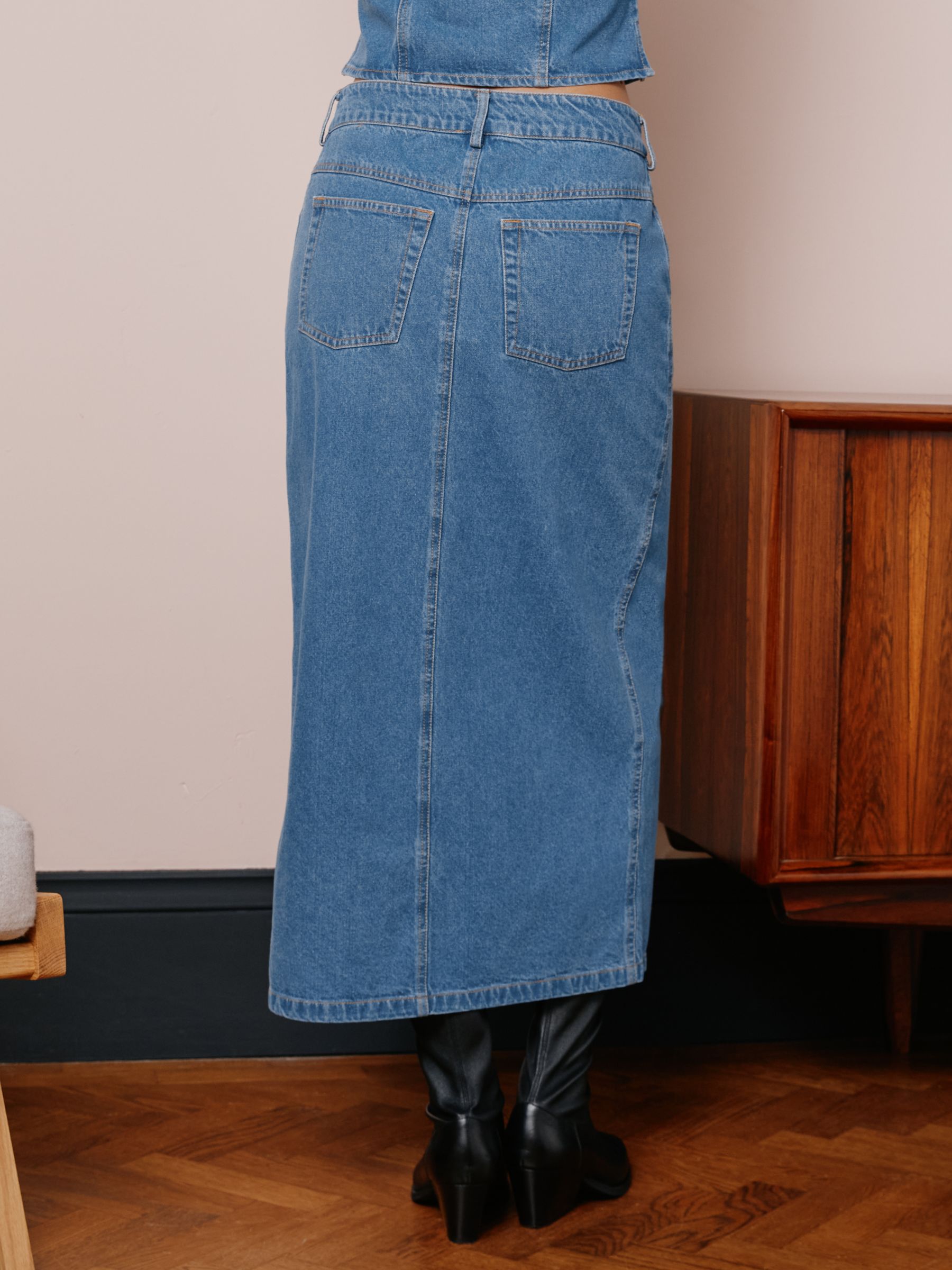 Long blue hotsell jean skirts 90s