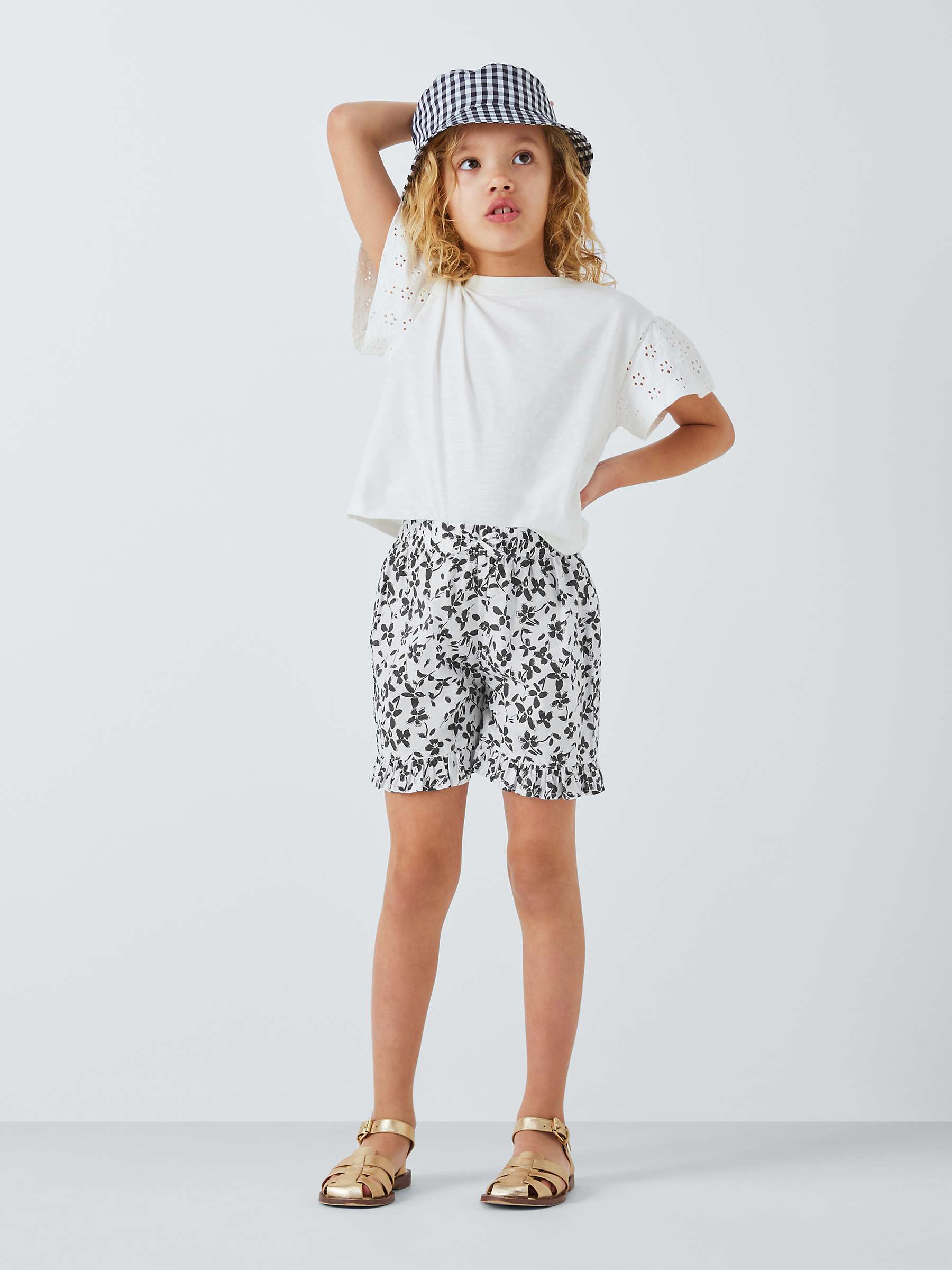 Buy John Lewis Kids' Monochrome Floral Frill Beach Shorts, White/Black Online at johnlewis.com