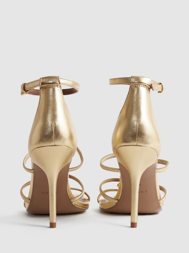 Gold three strap online heels