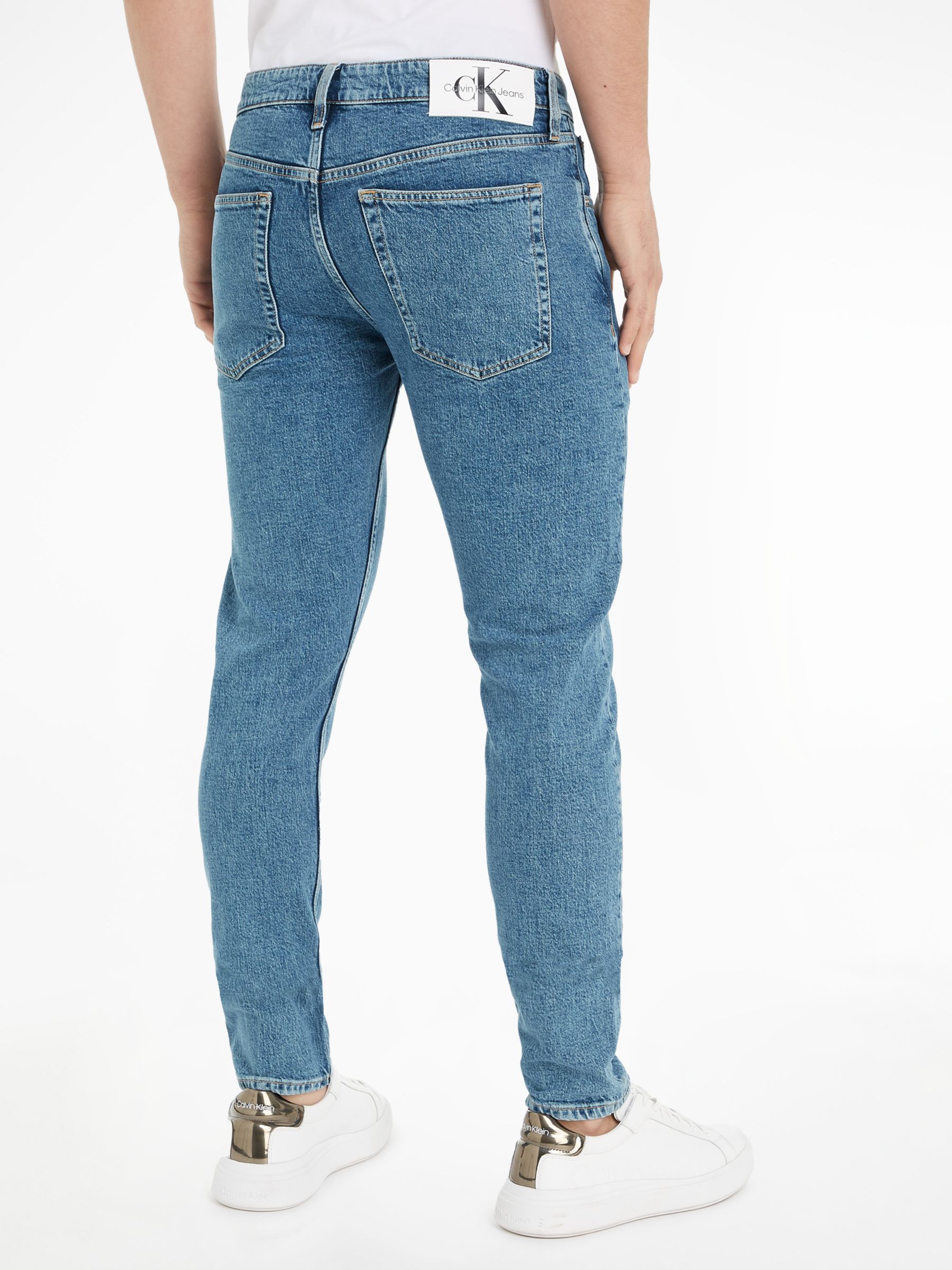 Buy Calvin Klein Jeans Slim Taper Jeans, Light Denim Online at johnlewis.com