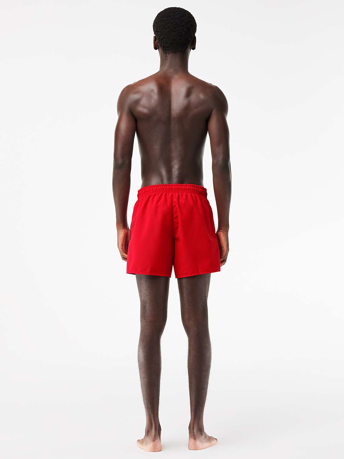 Buy Lacoste Plain Logo Swim Shorts Online at johnlewis.com