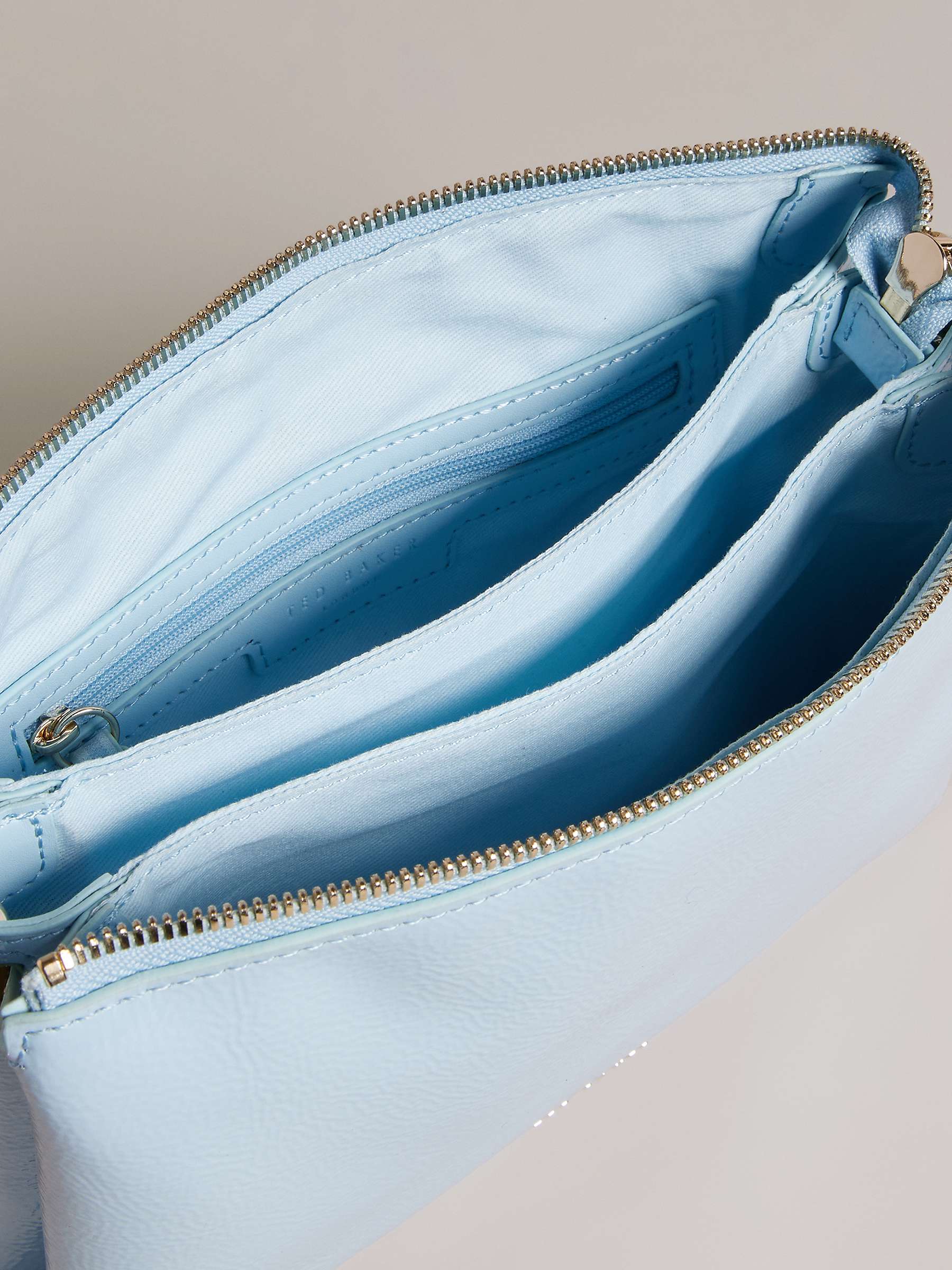 Buy Ted Baker Darceyy Branded Strap Patent Leather Crossbody Bag, Light Blue Online at johnlewis.com