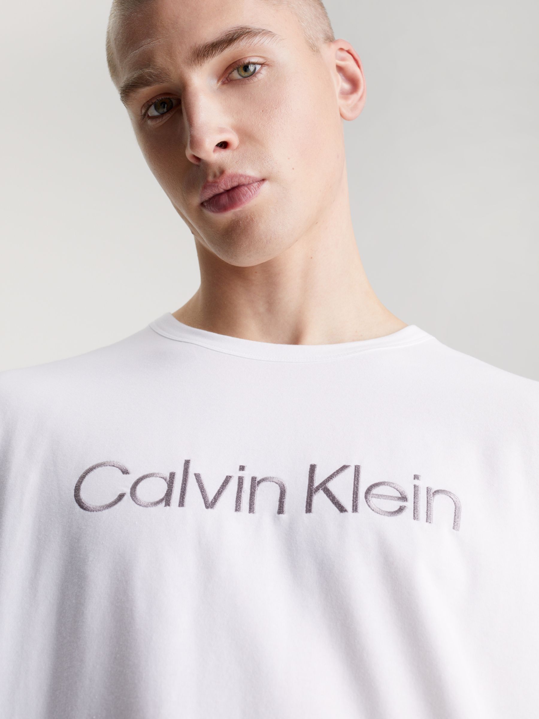 Buy Calvin Klein Slogan Crew Neck Lounge Top, White Online at johnlewis.com