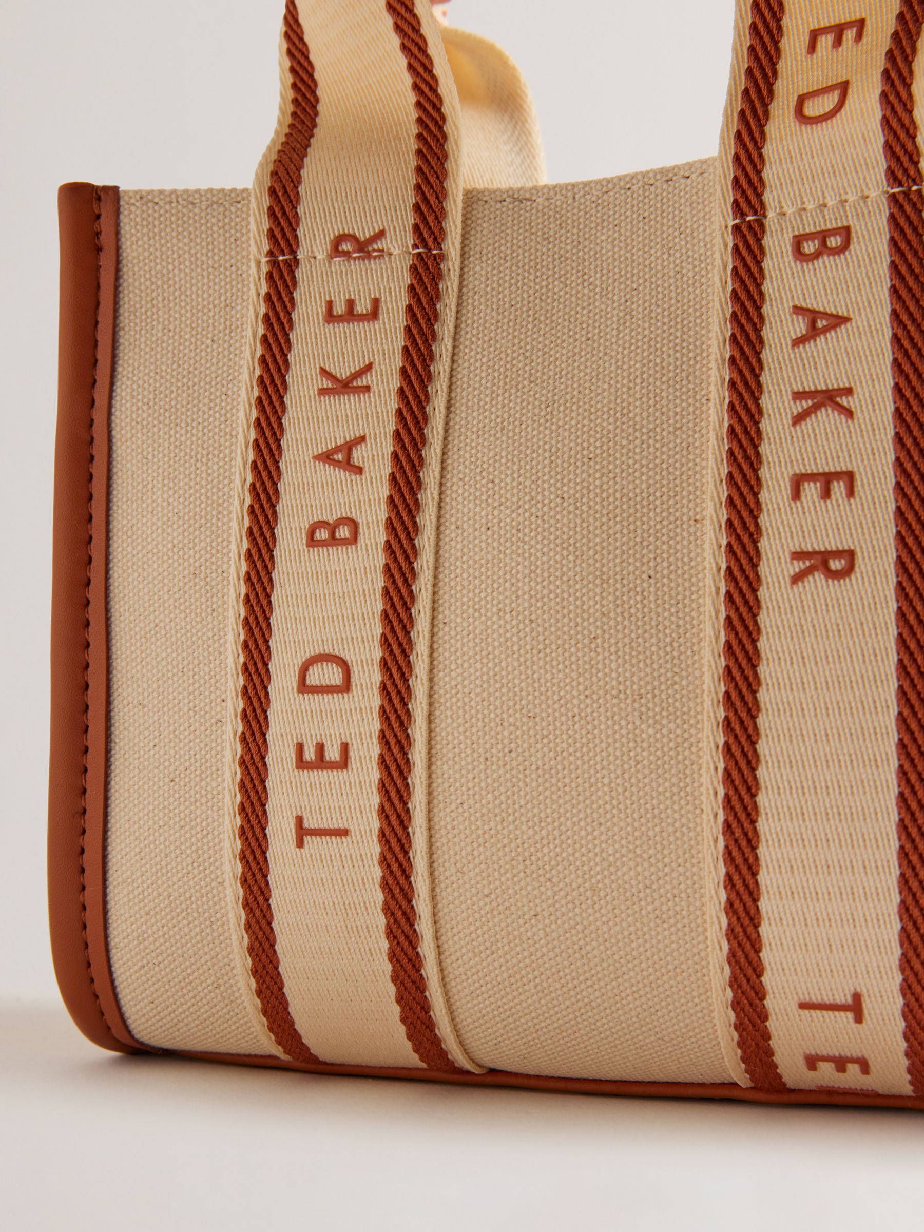 Buy Ted Baker Georjiy Branded Webbing Canvas Mini Tote Bag, Cream/Tan Online at johnlewis.com